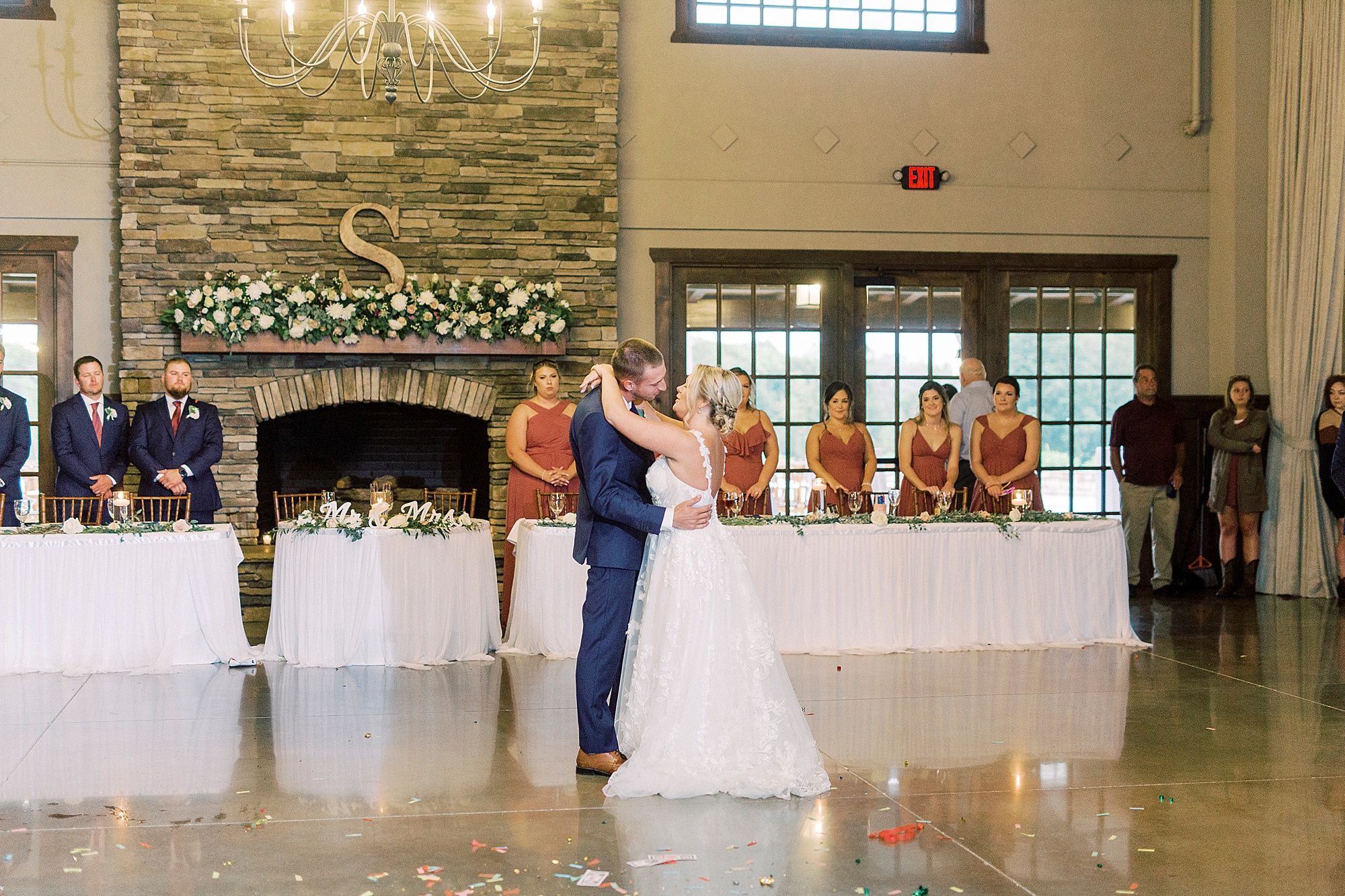 newlyweds kiss during first dance at Addison Farm