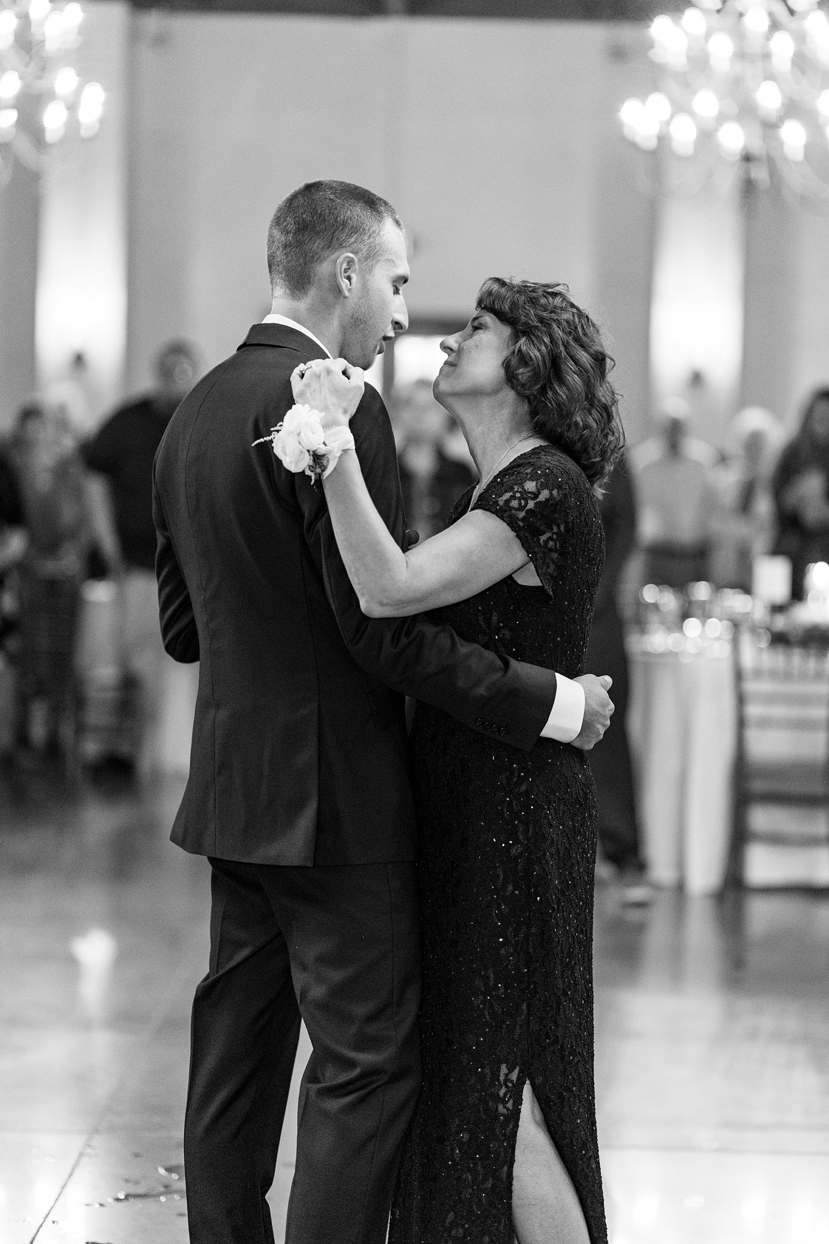 groom and mom dance during Greensboro NC wedding reception