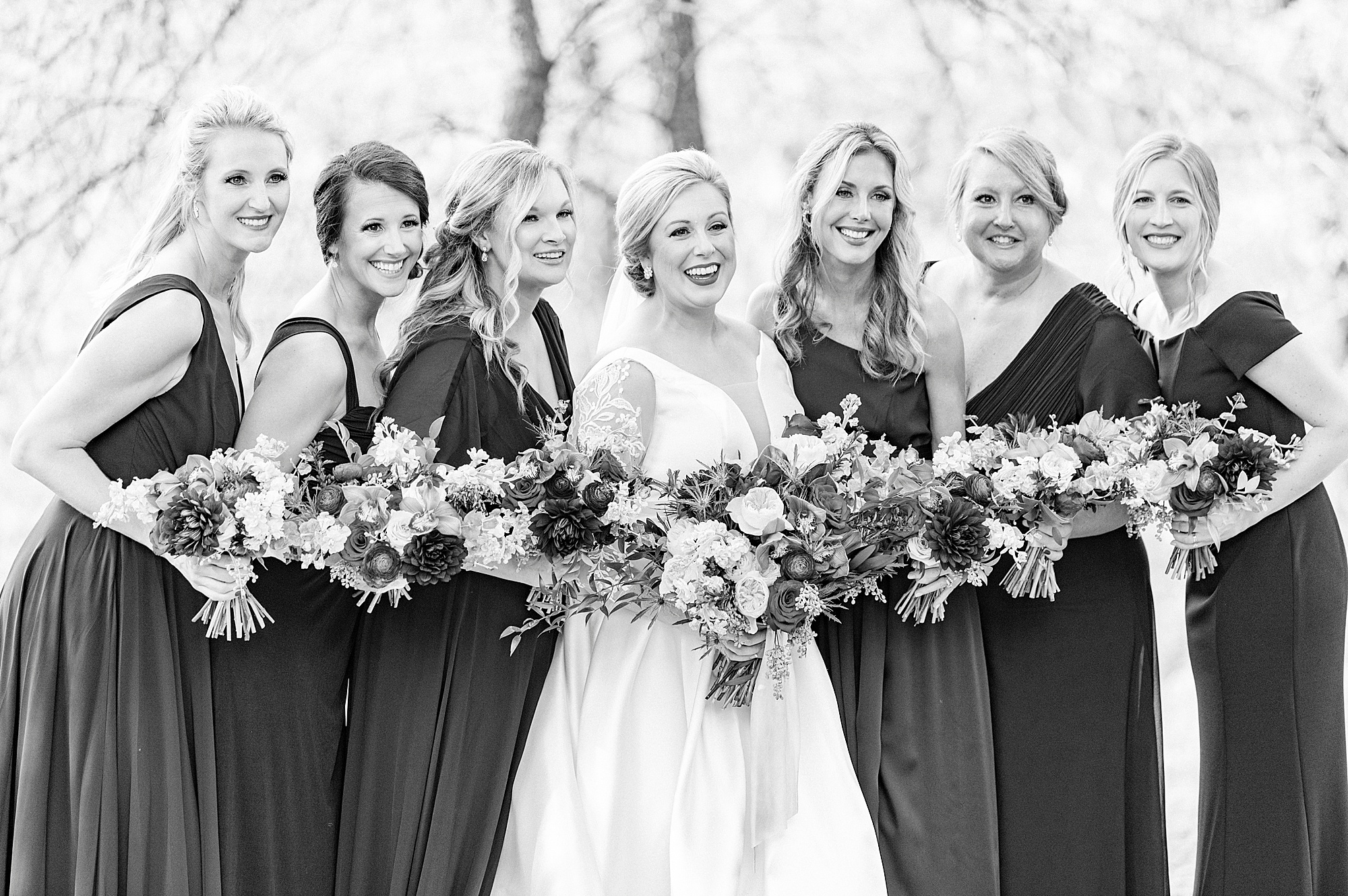 bride smiles with bridesmaids during fall Vesuvius Vineyards wedding