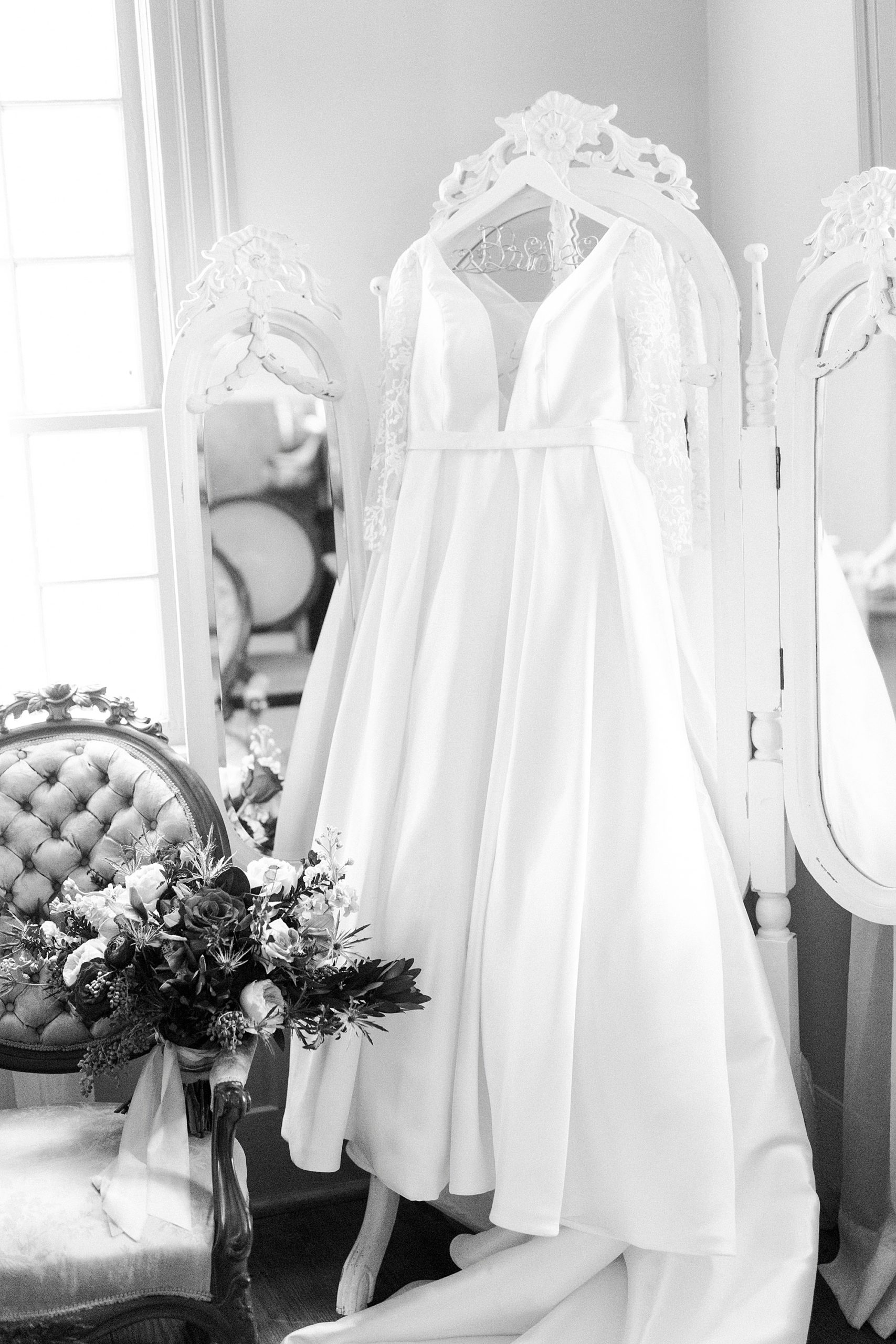 wedding dress hangs by mirror in Lincoln County NC
