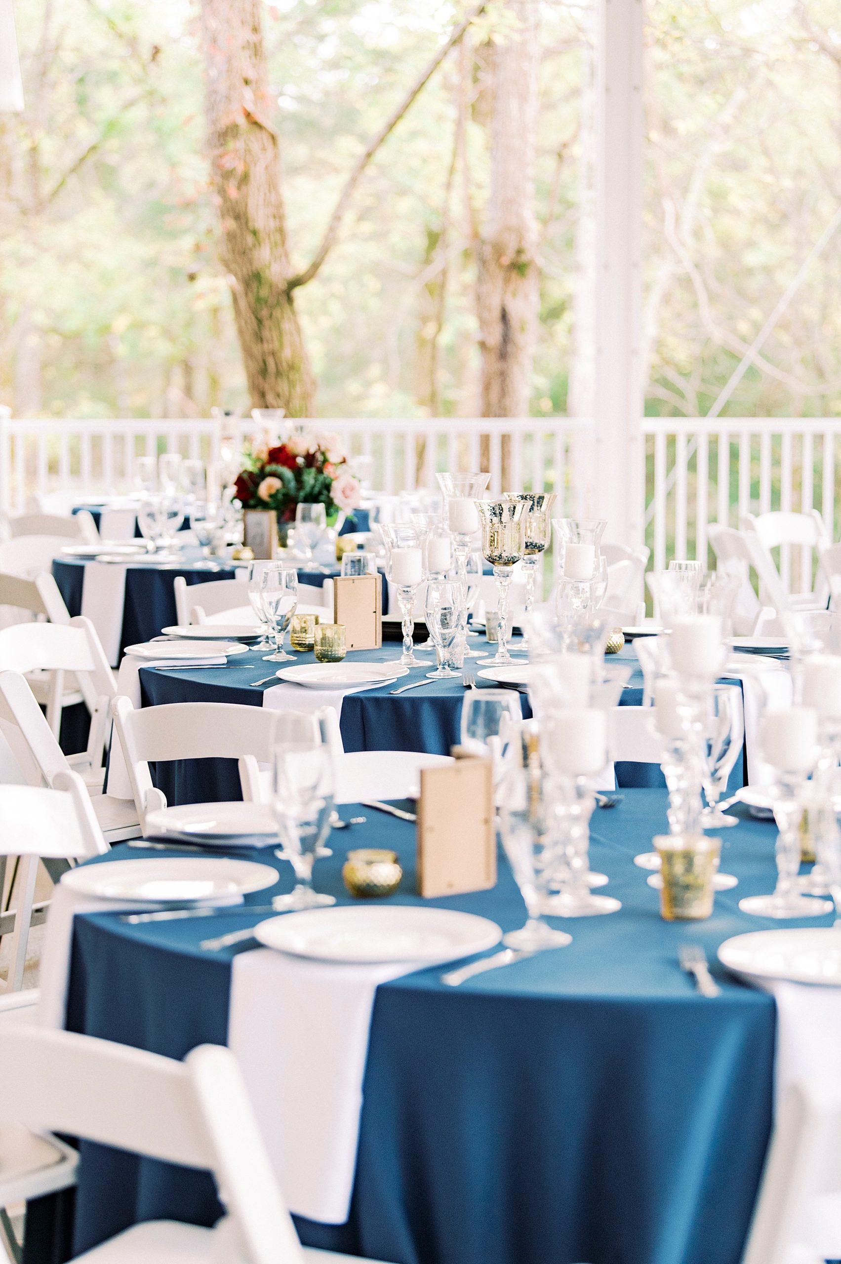 navy and white wedding reception decor at vineyard