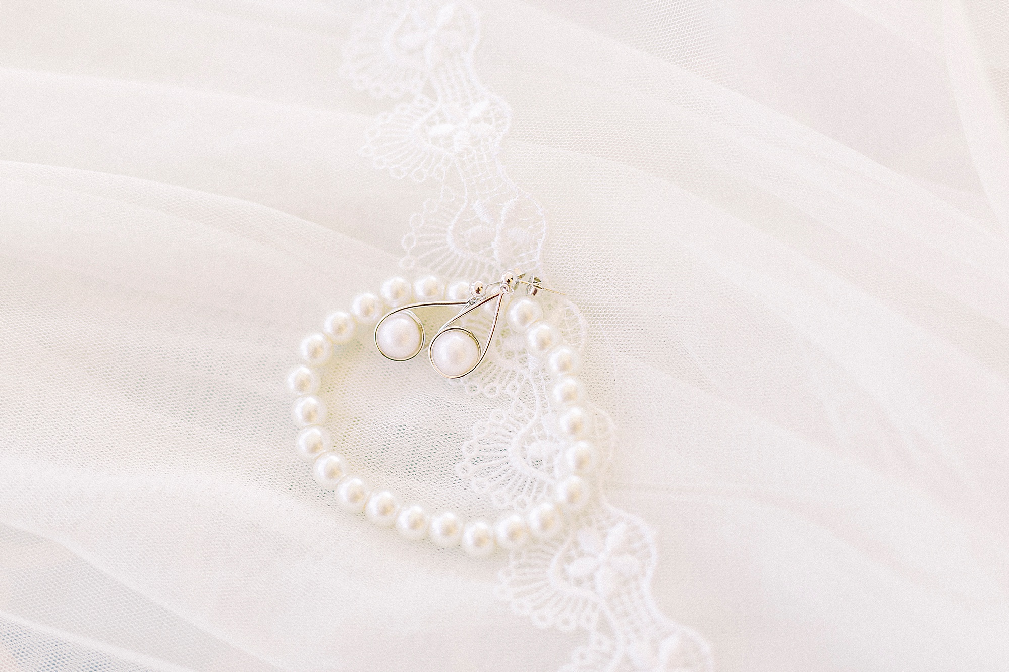 bride's pearl bracelet and earrings for NC wedding day