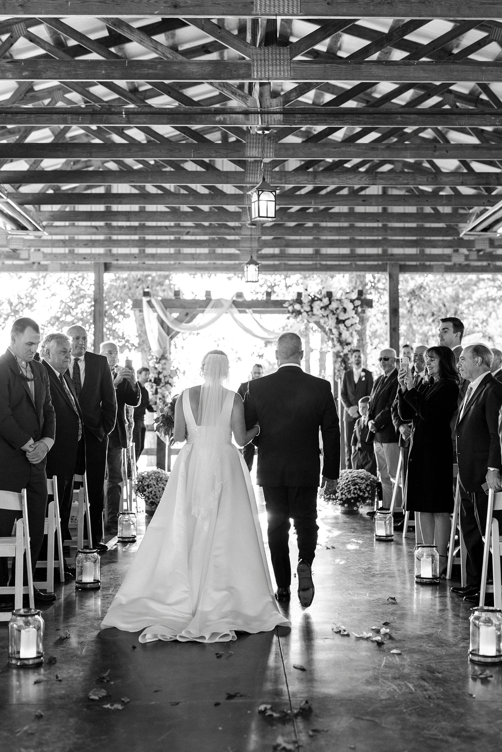 dad walks bride down aisle for fall wedding ceremony