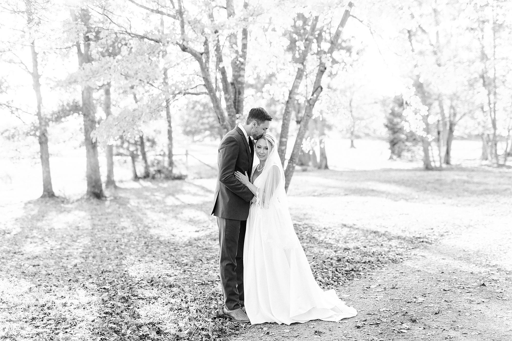 bride and groom hug during portraits at the Farm at Brusharbor
