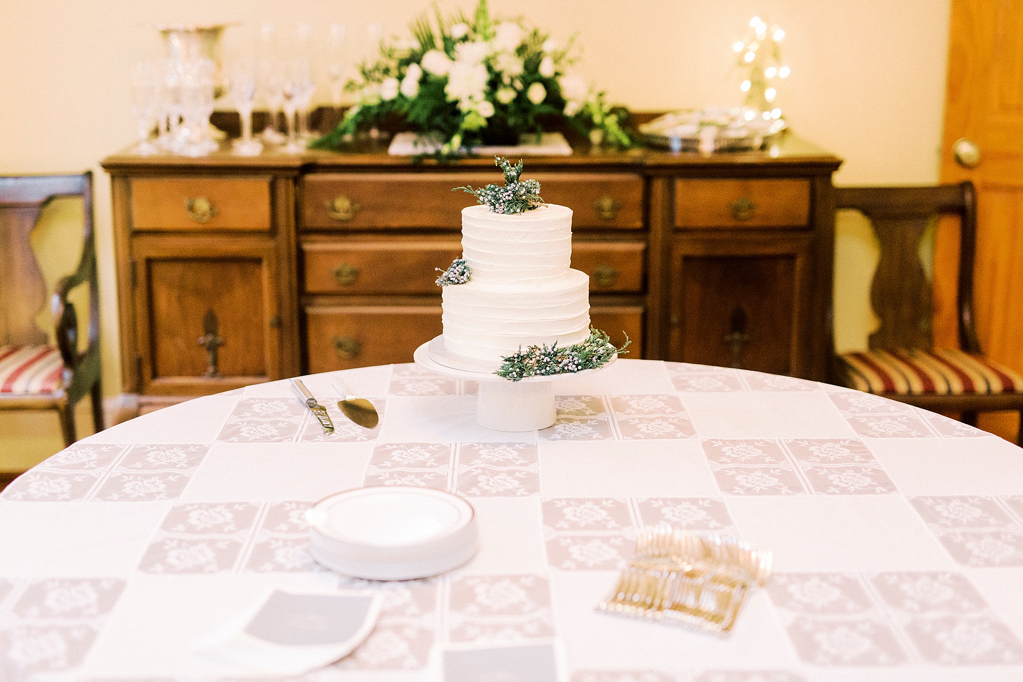 simple wedding cake with greenery