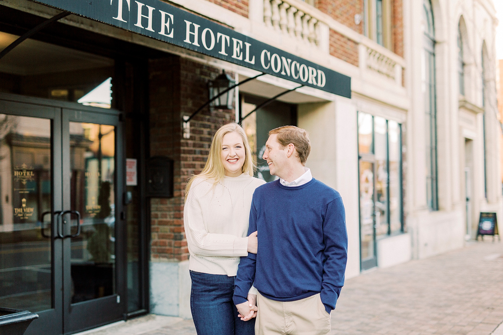 couple walks through Downtown Concord