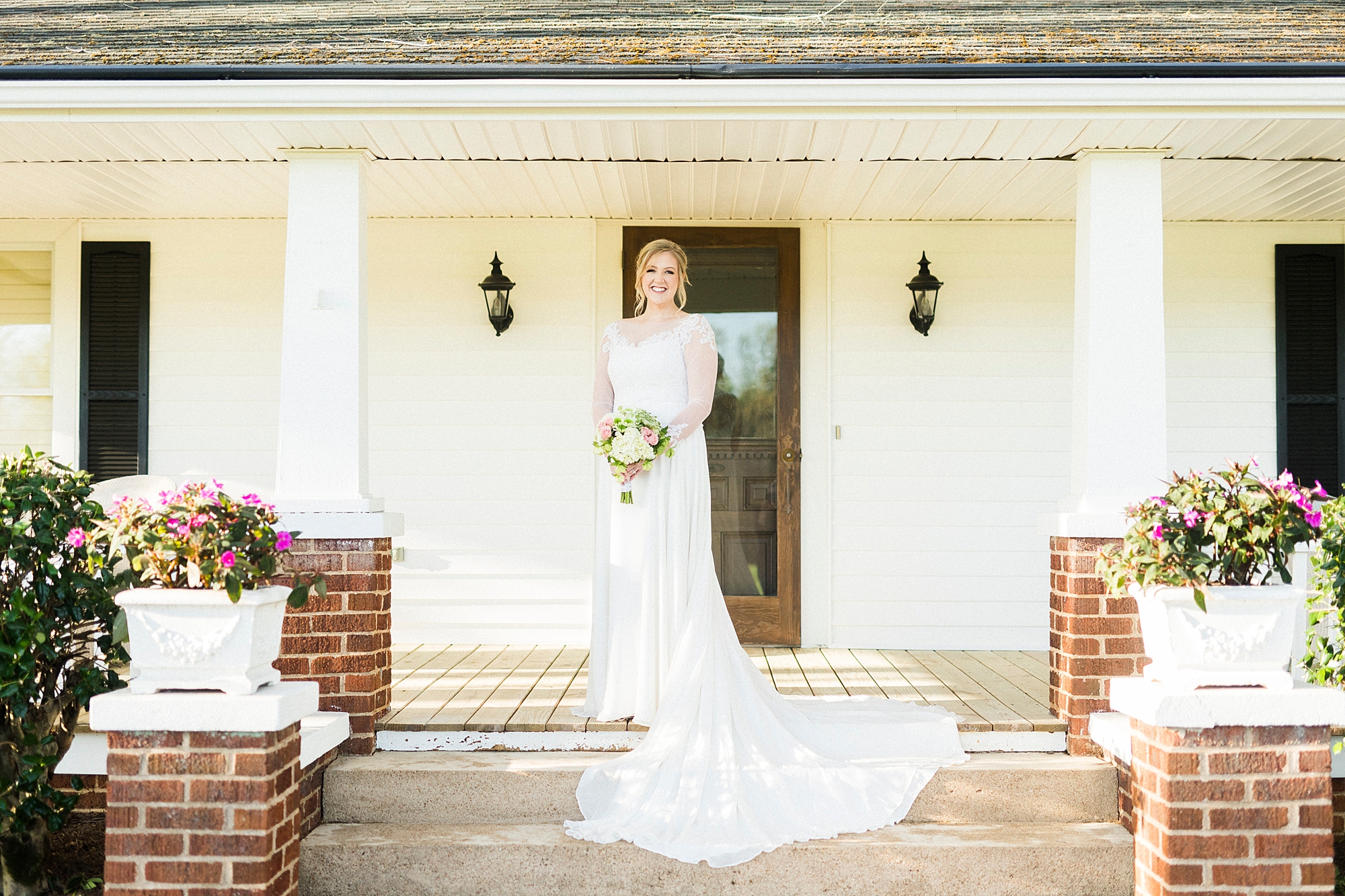 Mooresville bridal portraits on steps of farmhouse