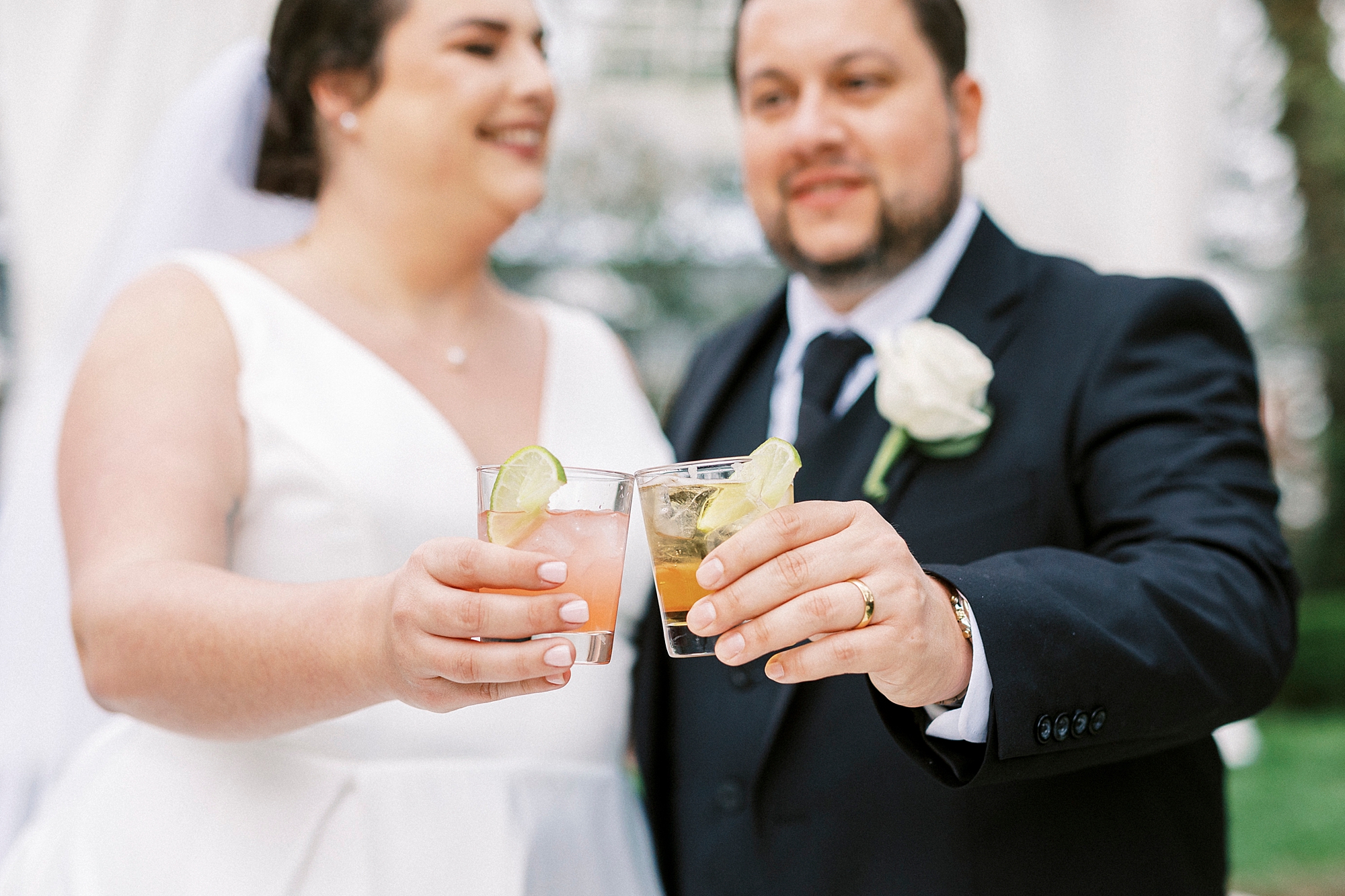 bride and groom toast drinks during cocktail hour at Separk Mansion