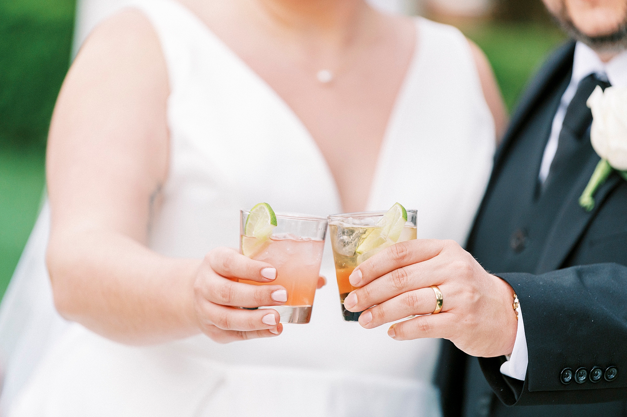 couple toasts custom cocktails for reception