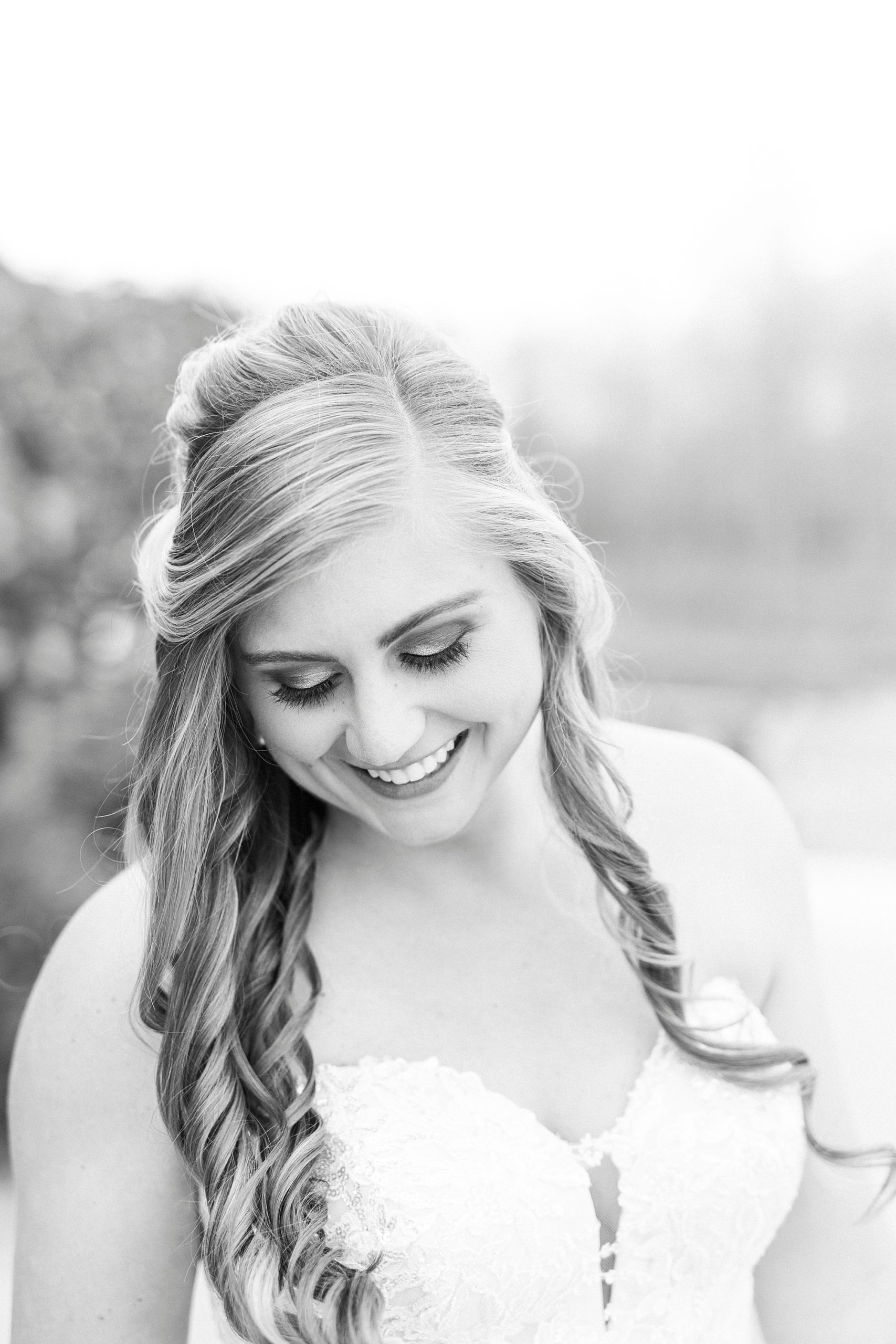 bride laughs at The Stable at Riverview