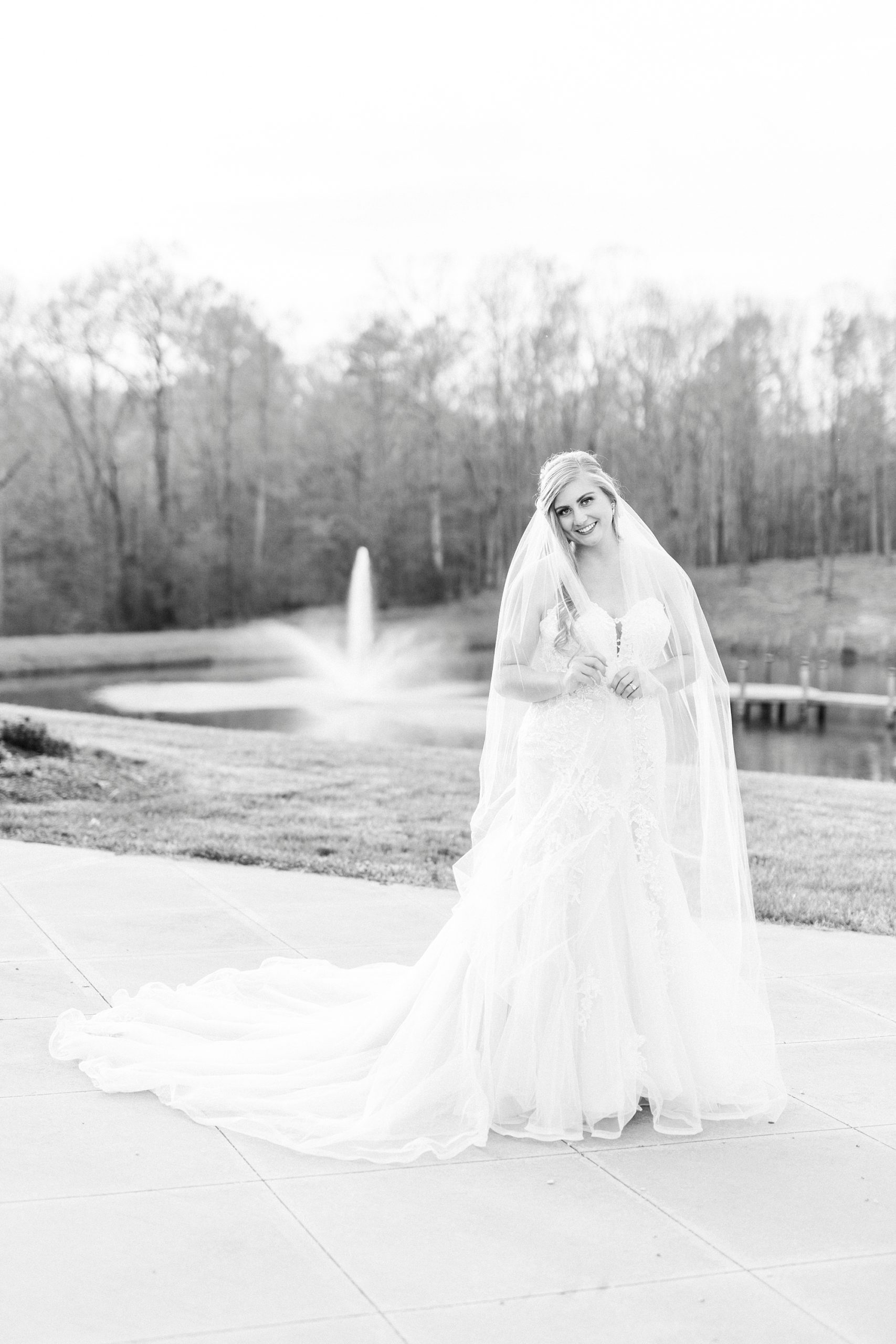 bride walks on stone patio at The Stable at Riverview