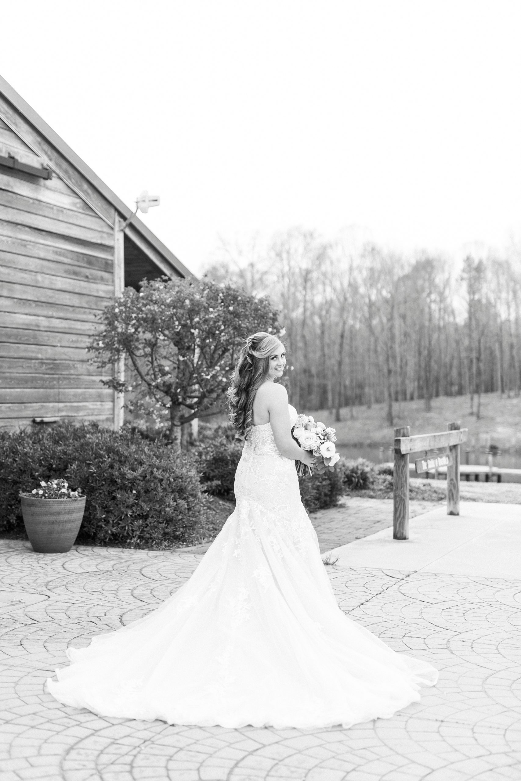 bride looks over shoulder during bridal session