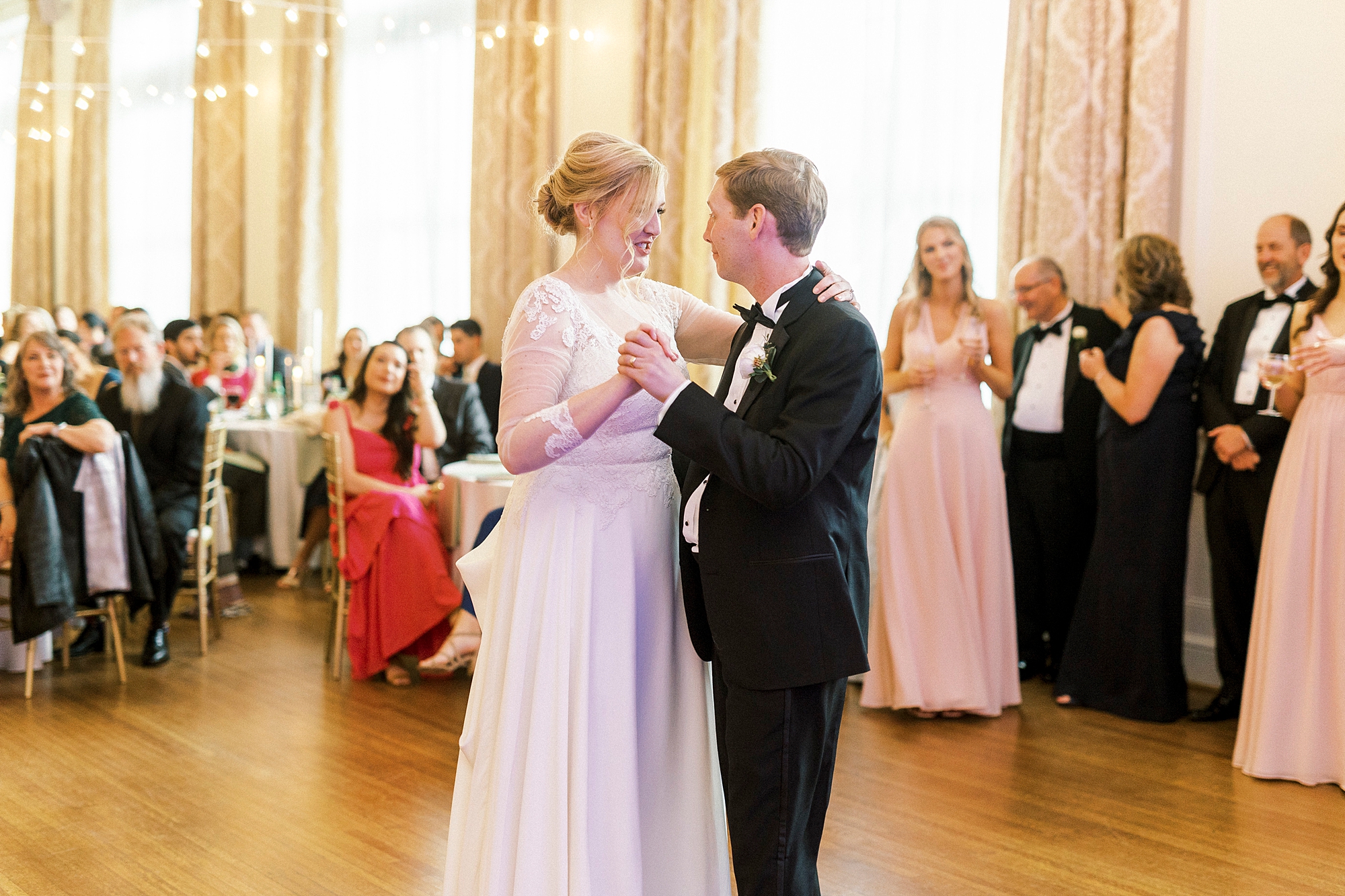 groom dances with mom during Concord NC wedding reception