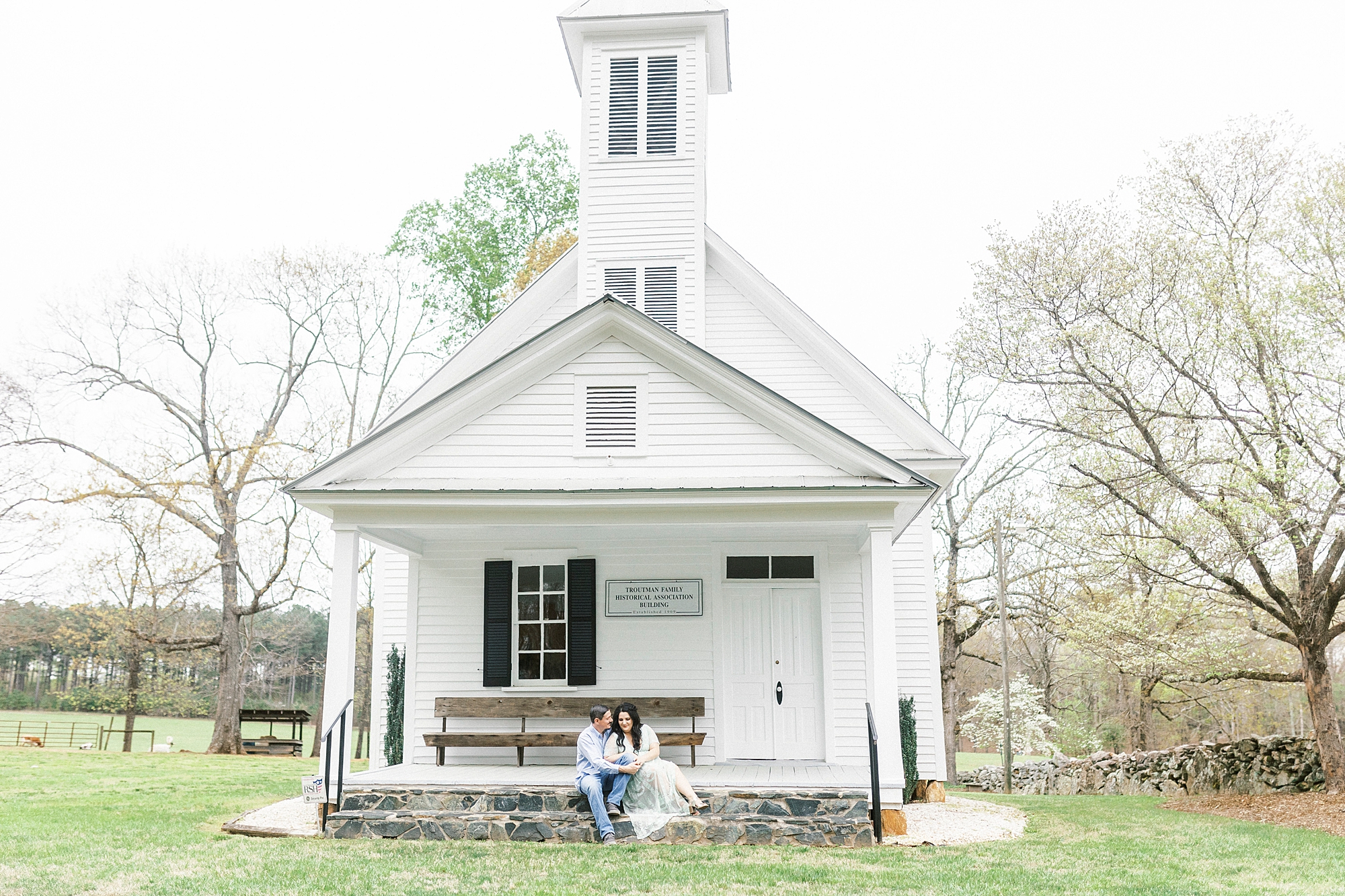 White Chapel engagement session for couple on family's property