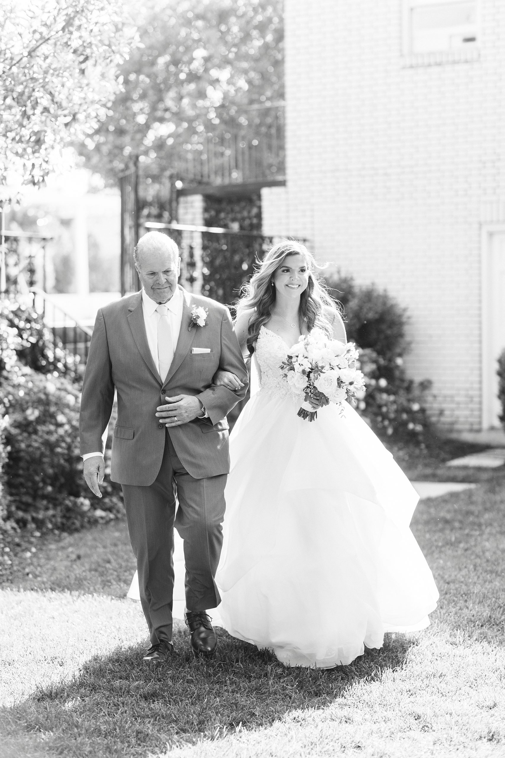 bride and father walk down aisle for ceremony at Separk Mansion