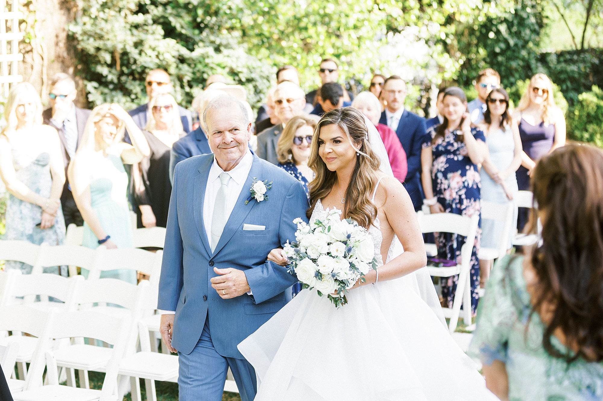 bride walks down aisle with father at Separk Mansion
