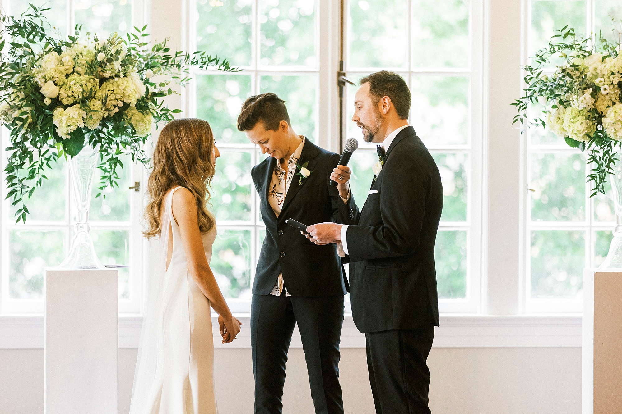 groom reads vows during wedding ceremony in Gastonia NC