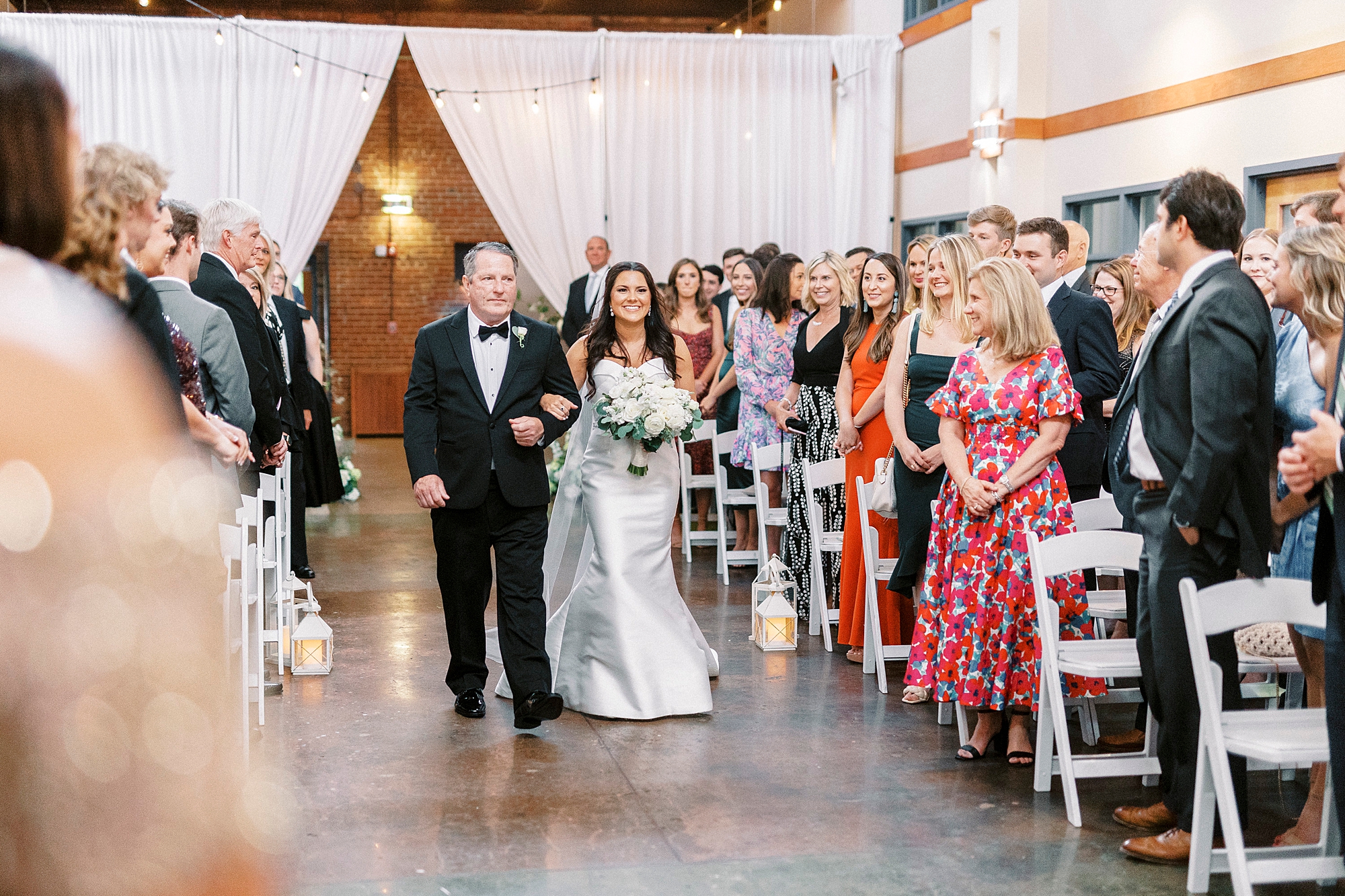 dad walks bride down aisle at Design Atrium