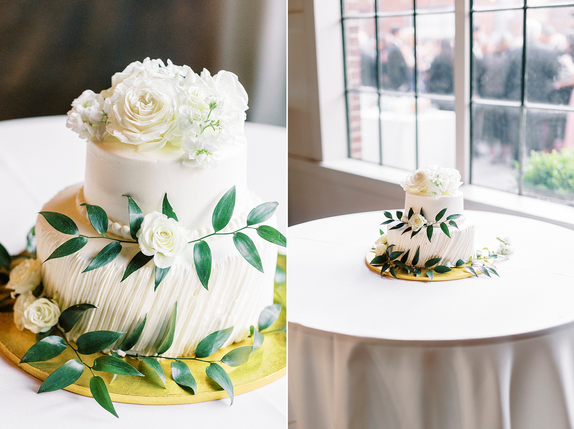 tiered wedding cake with greenery draped around edge