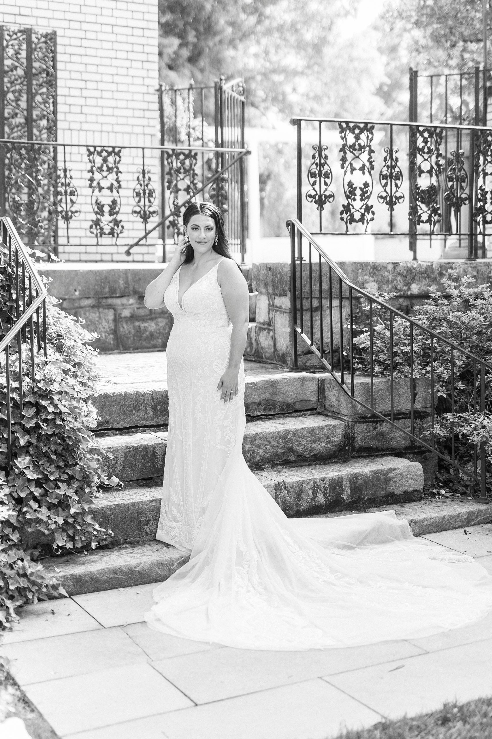 black and white portrait of bride standing outside Separk Mansion