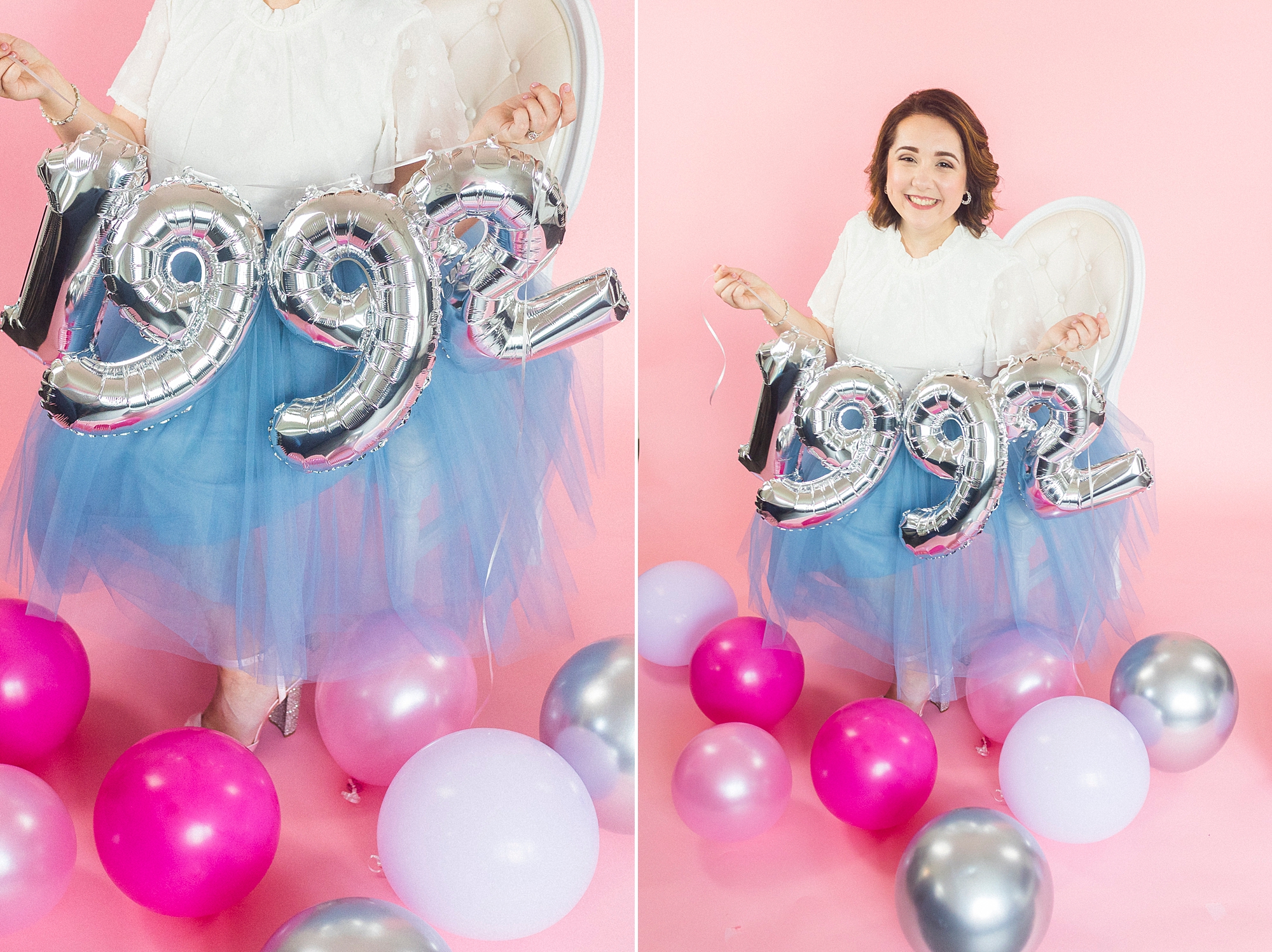 woman sits with 1992 balloons and pink balloons at her feet