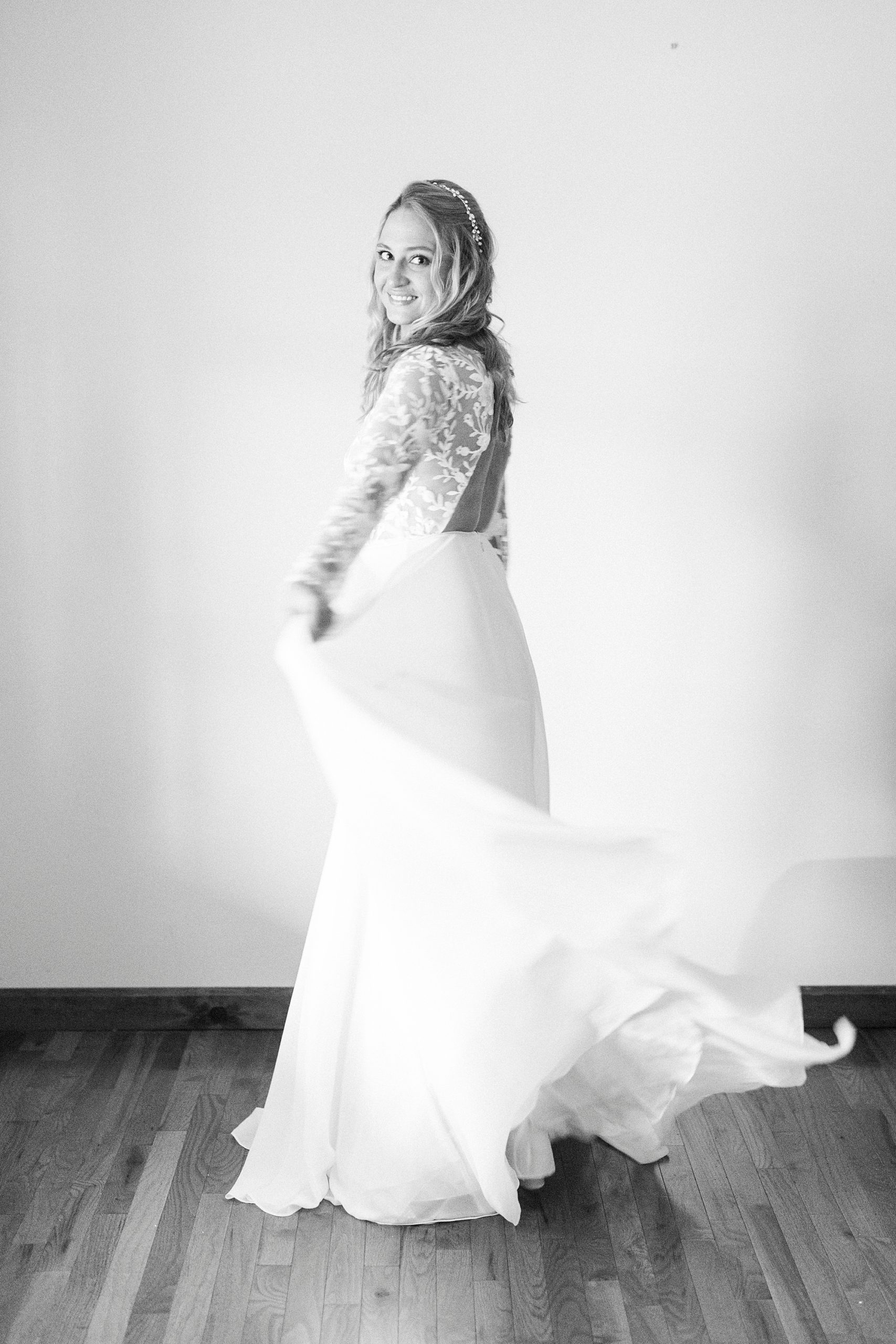 bride twirls with wedding dress