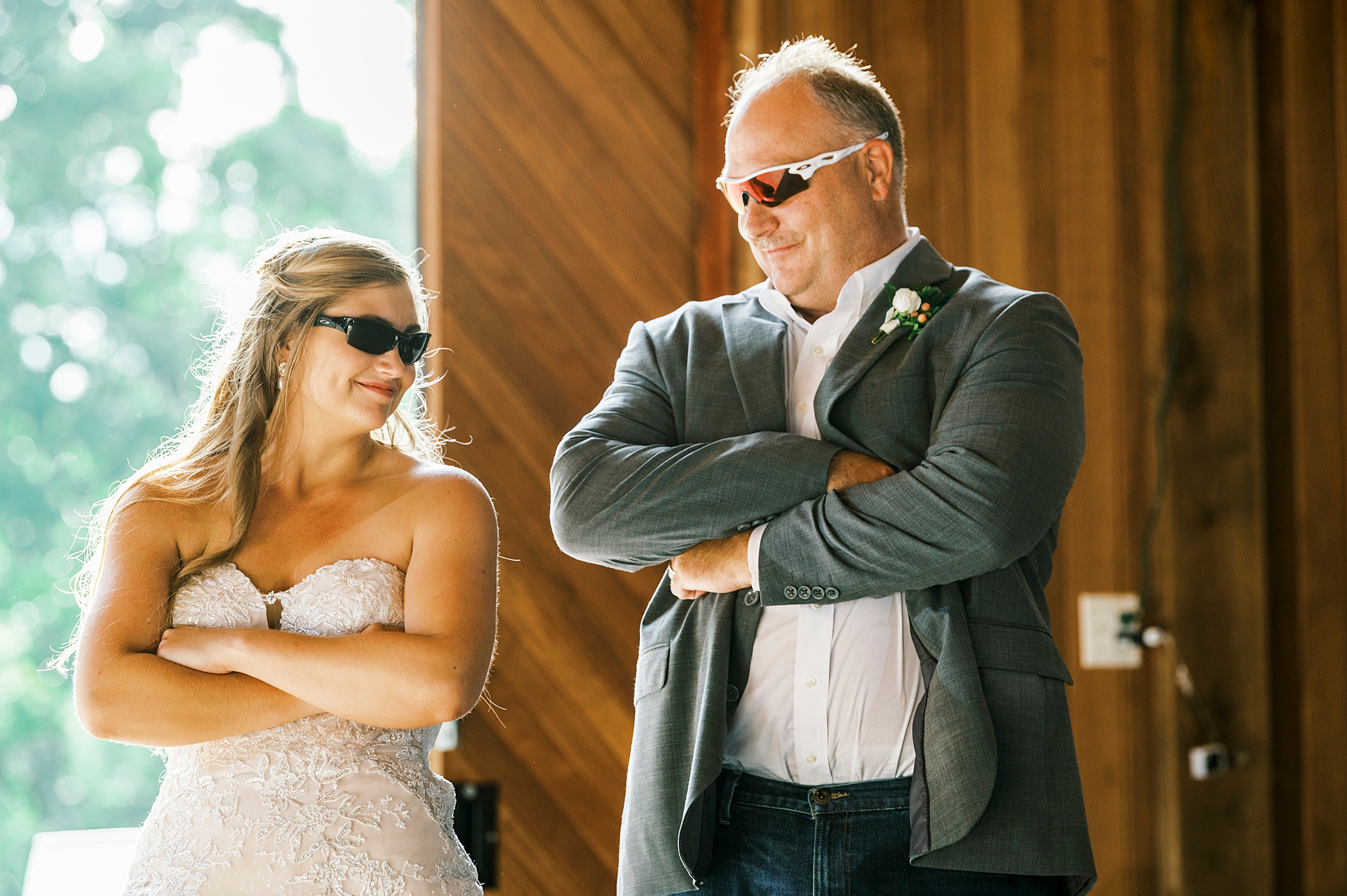 bride and dad wear sunglasses during wedding reception in NC