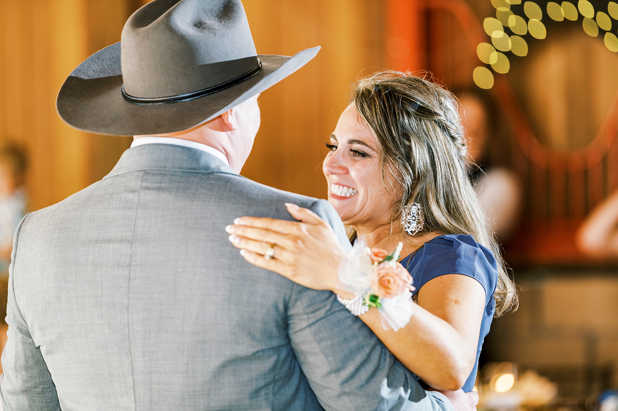 groom dances with mother during NC wedding reception 