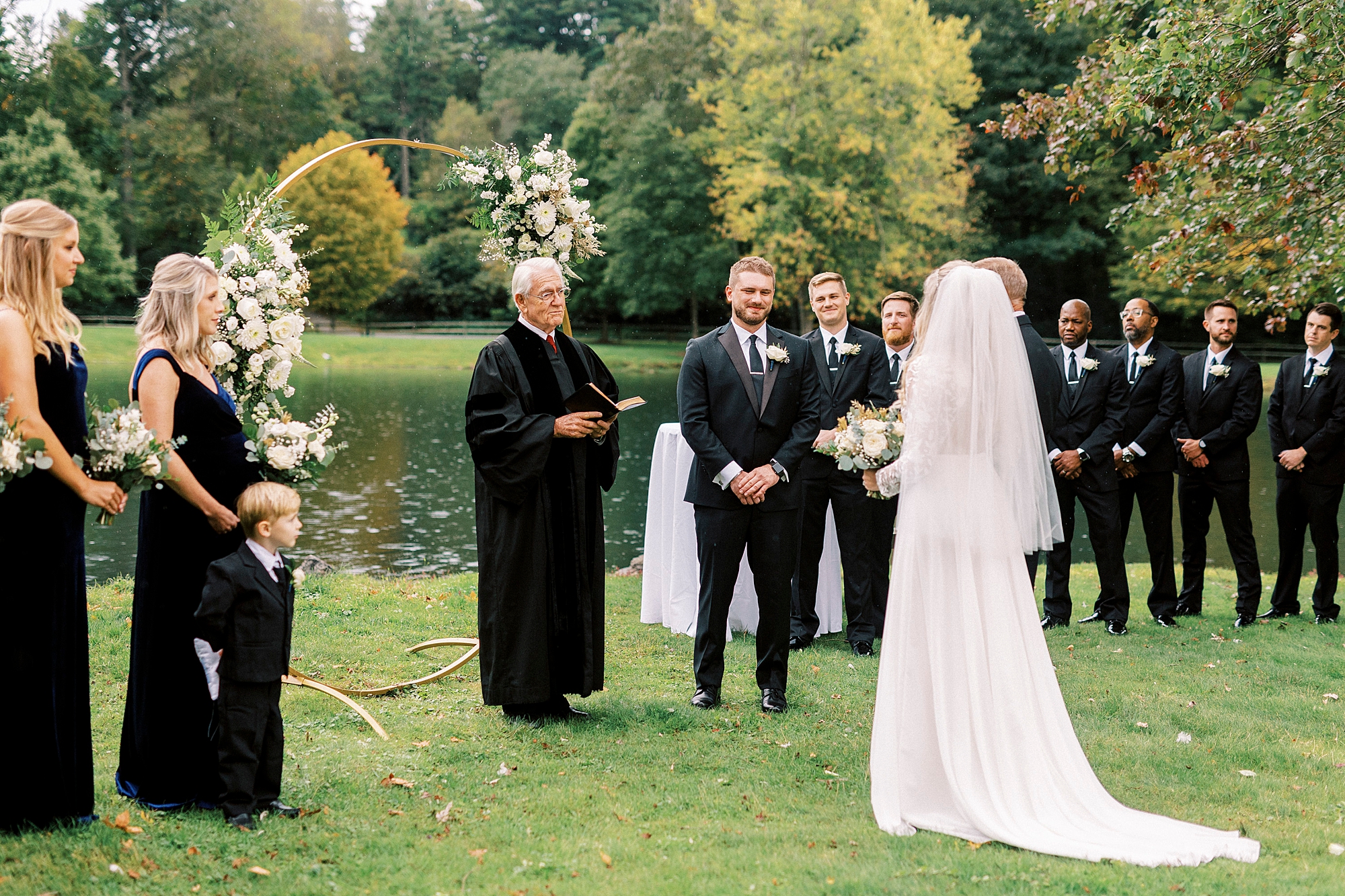 bride and dad approach officiant for outdoor ceremony at Chetola Resort