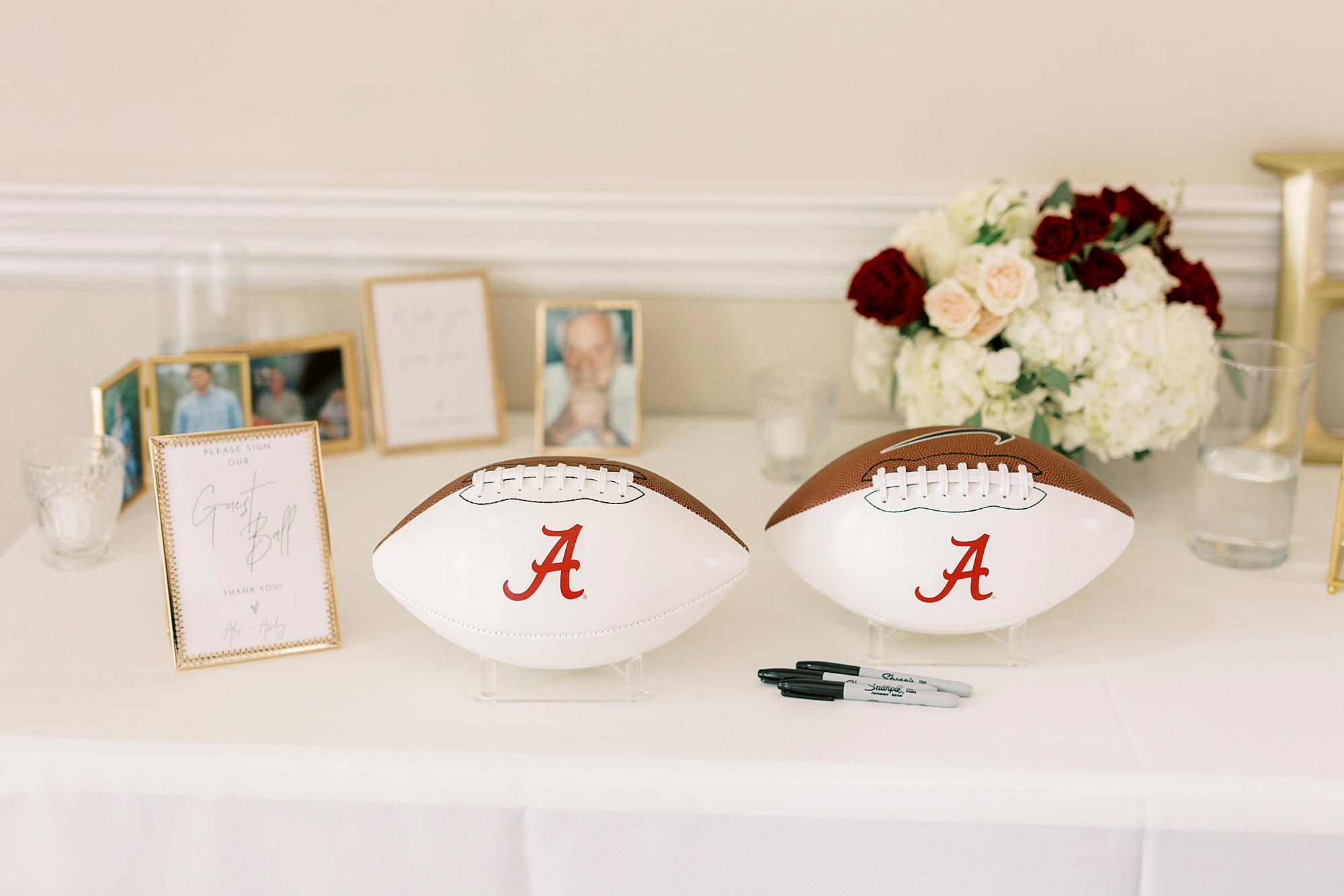 footballs with Alabama logo for guest book