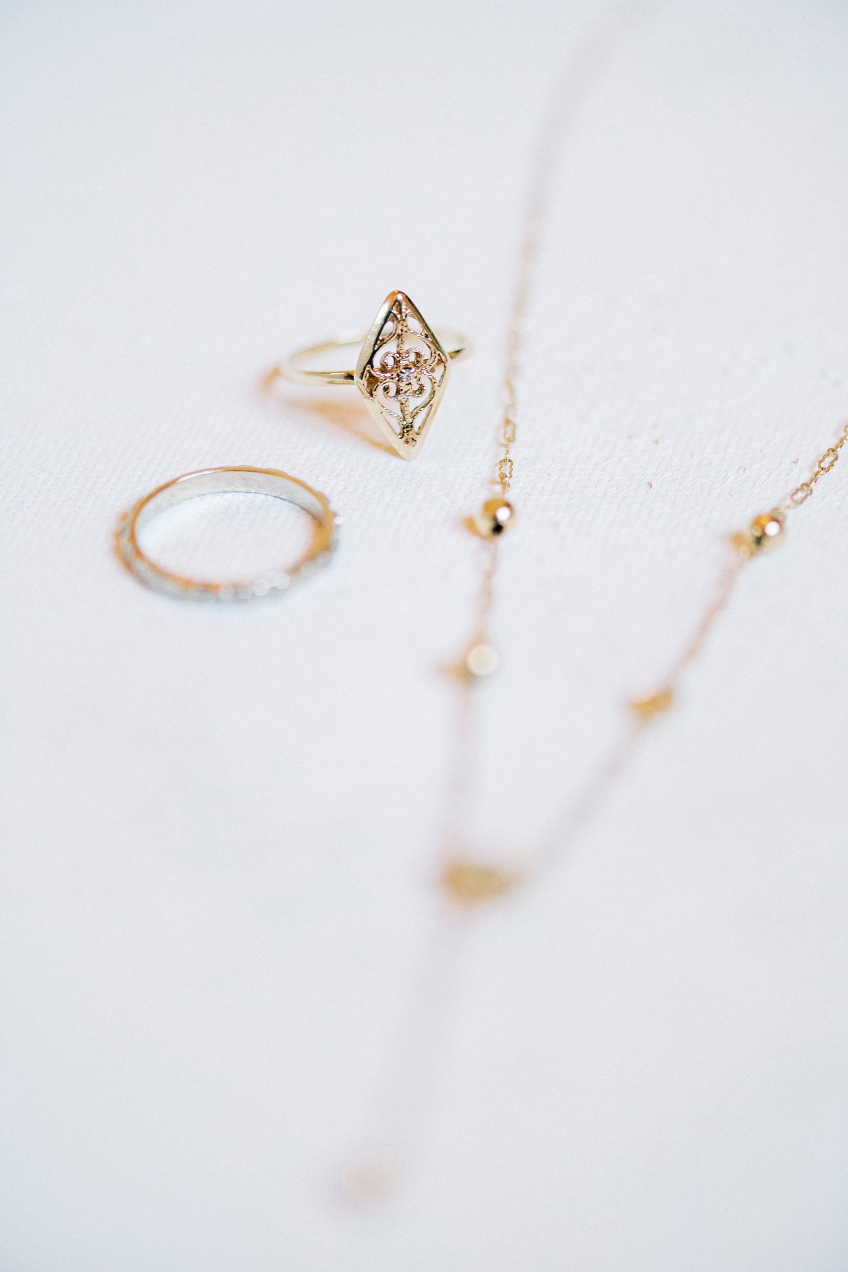bride's gold jewelry for Chickadee Hill Farms wedding