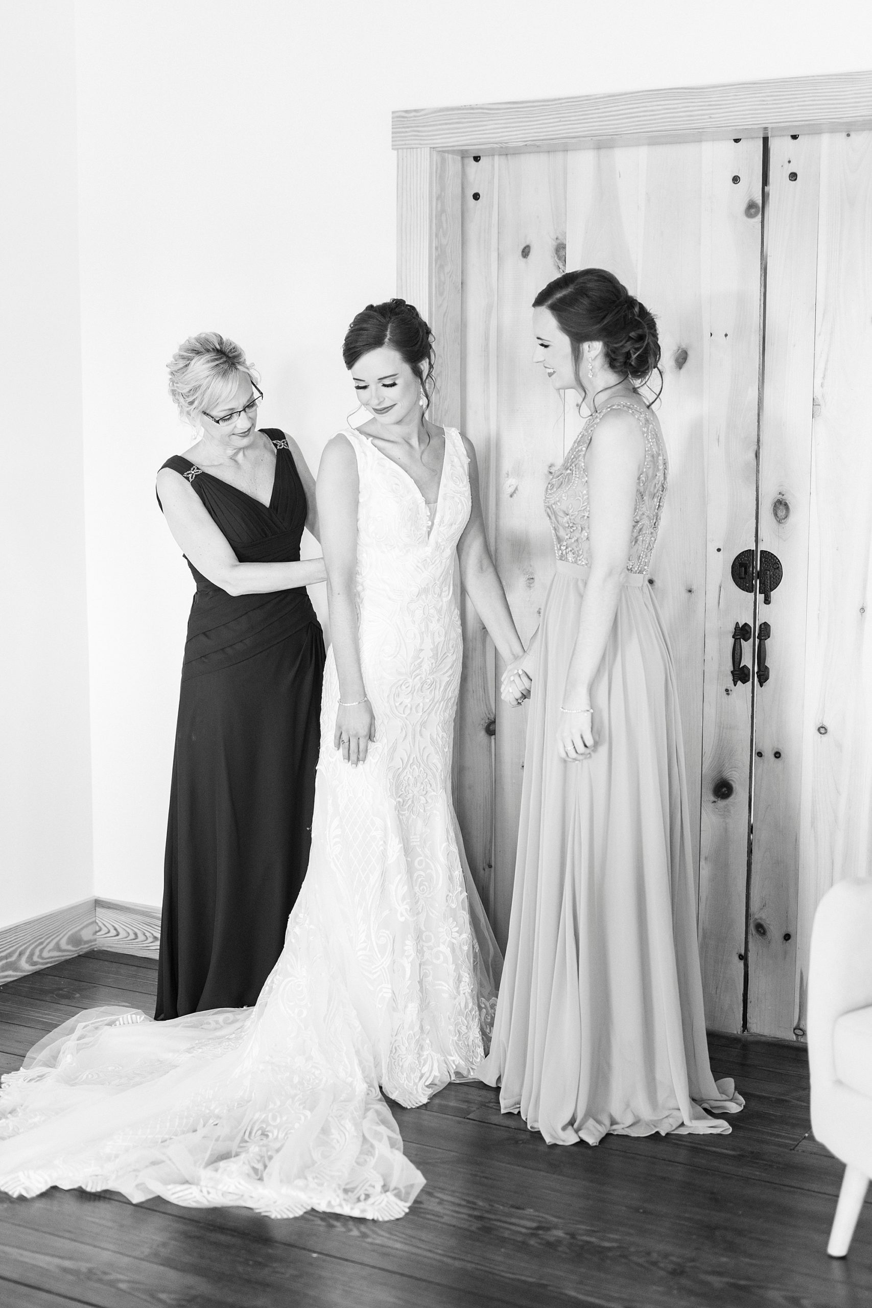 bride, bridesmaid, and mother get ready for NC wedding 