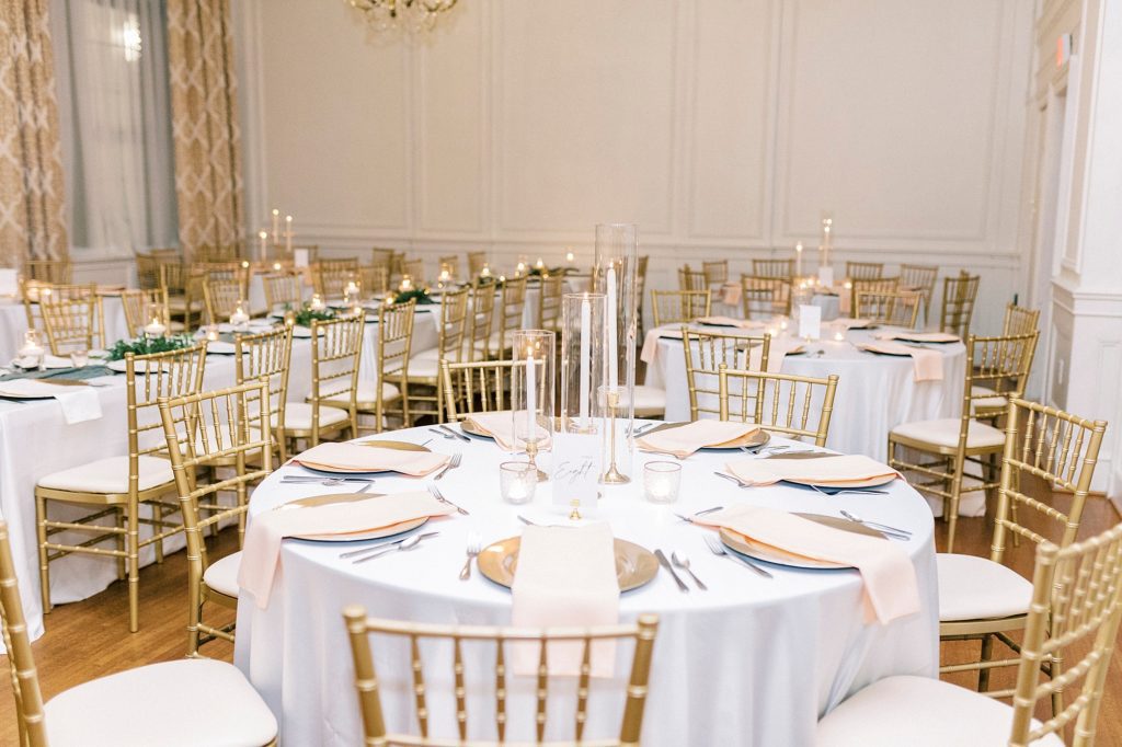 round table at the Hotel Concord with gold and ivory details
