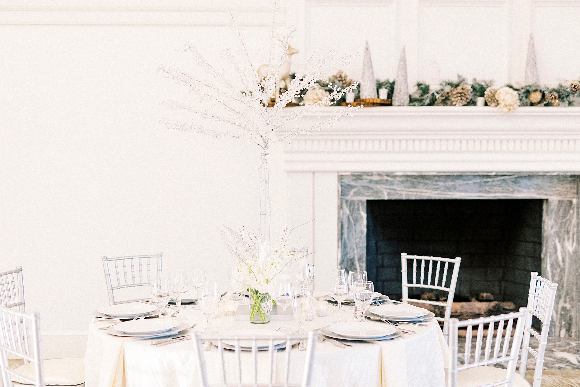 Winter Wonderland wedding at River Run Country Club with white and blue accents 