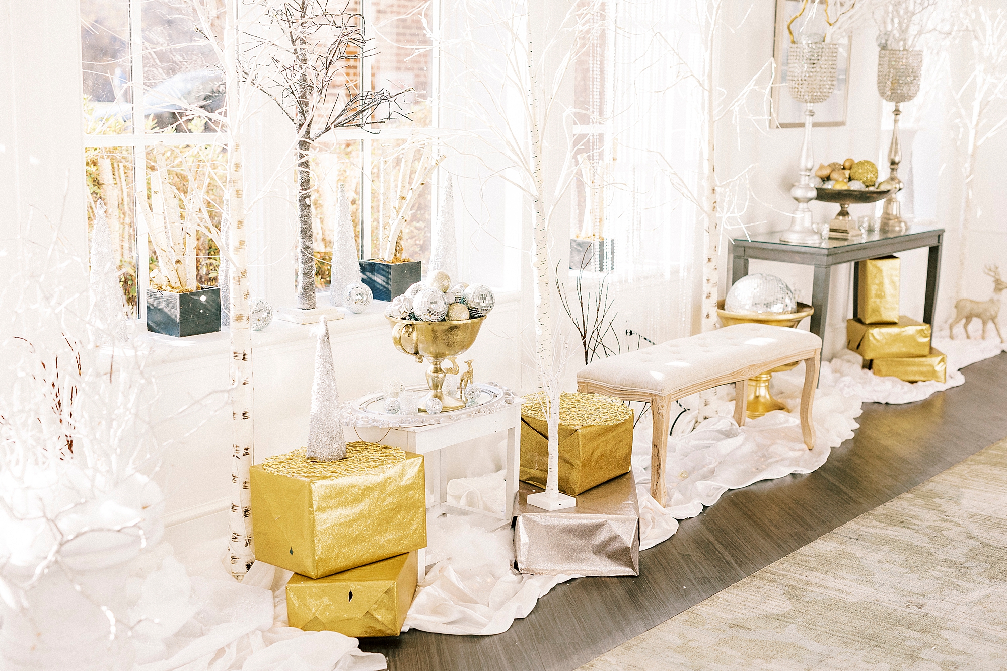 Winter Wonderland wedding at River Run Country Club seating area with gold accents 
