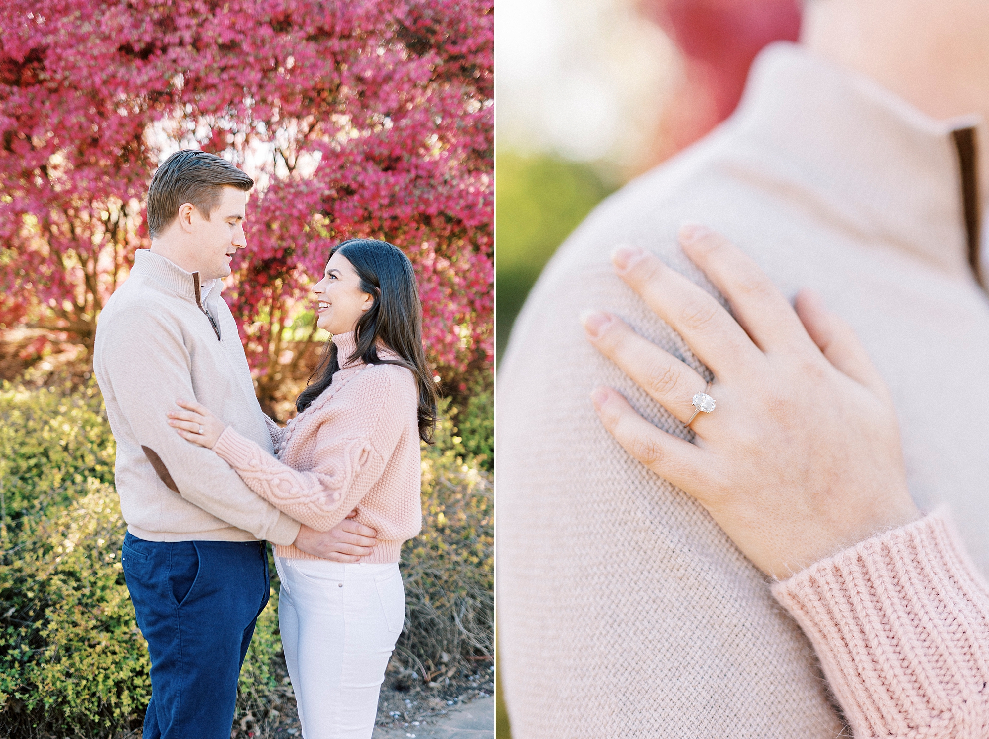 engaged couple hugs by pink tree with woman holding man's shoulder with ring showing 