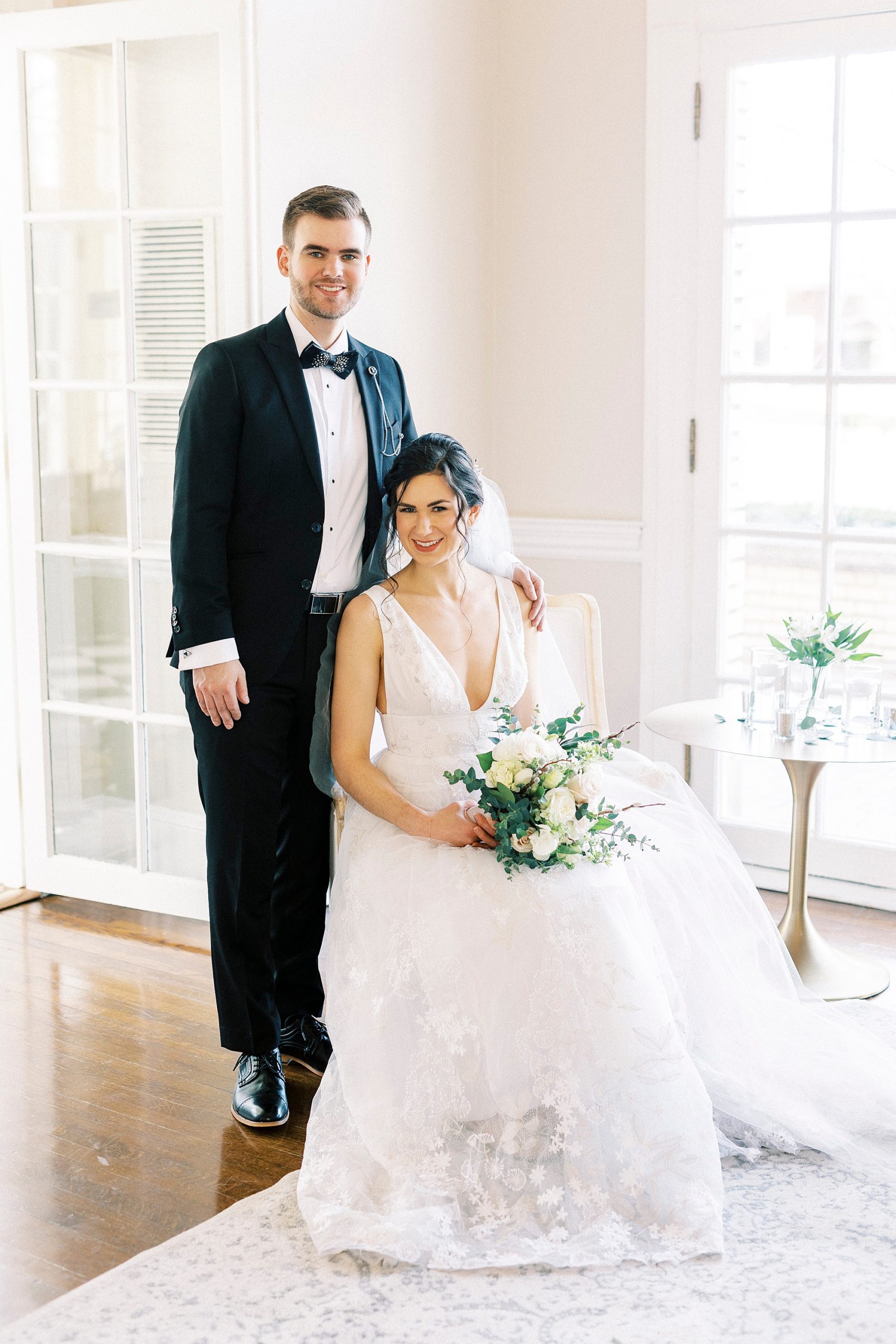 bride and groom sit inside the Separk Mansion