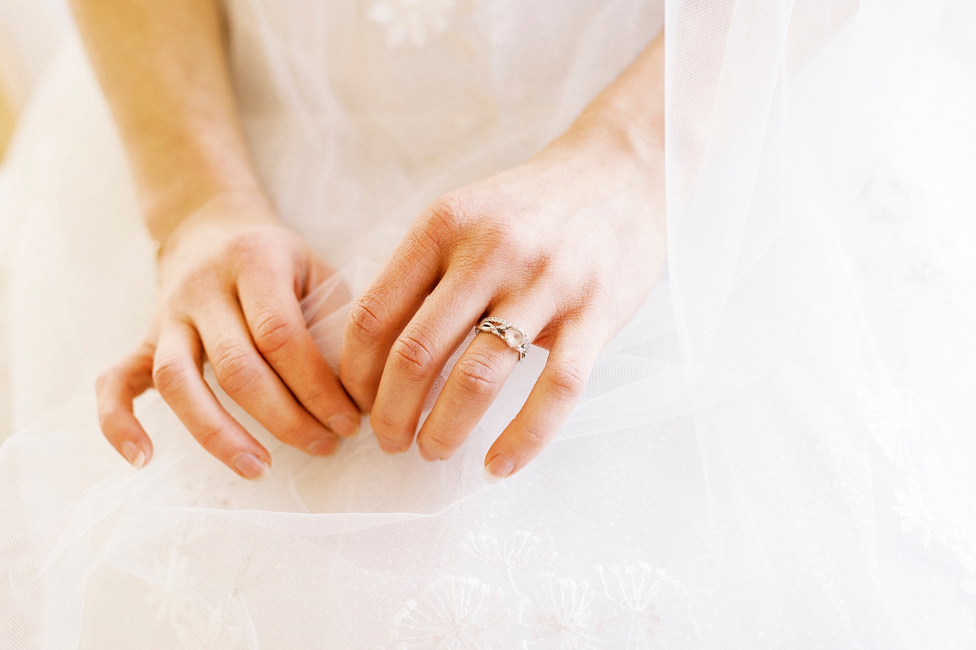 bride holds veil showing off engagement ring at Separk Mansion