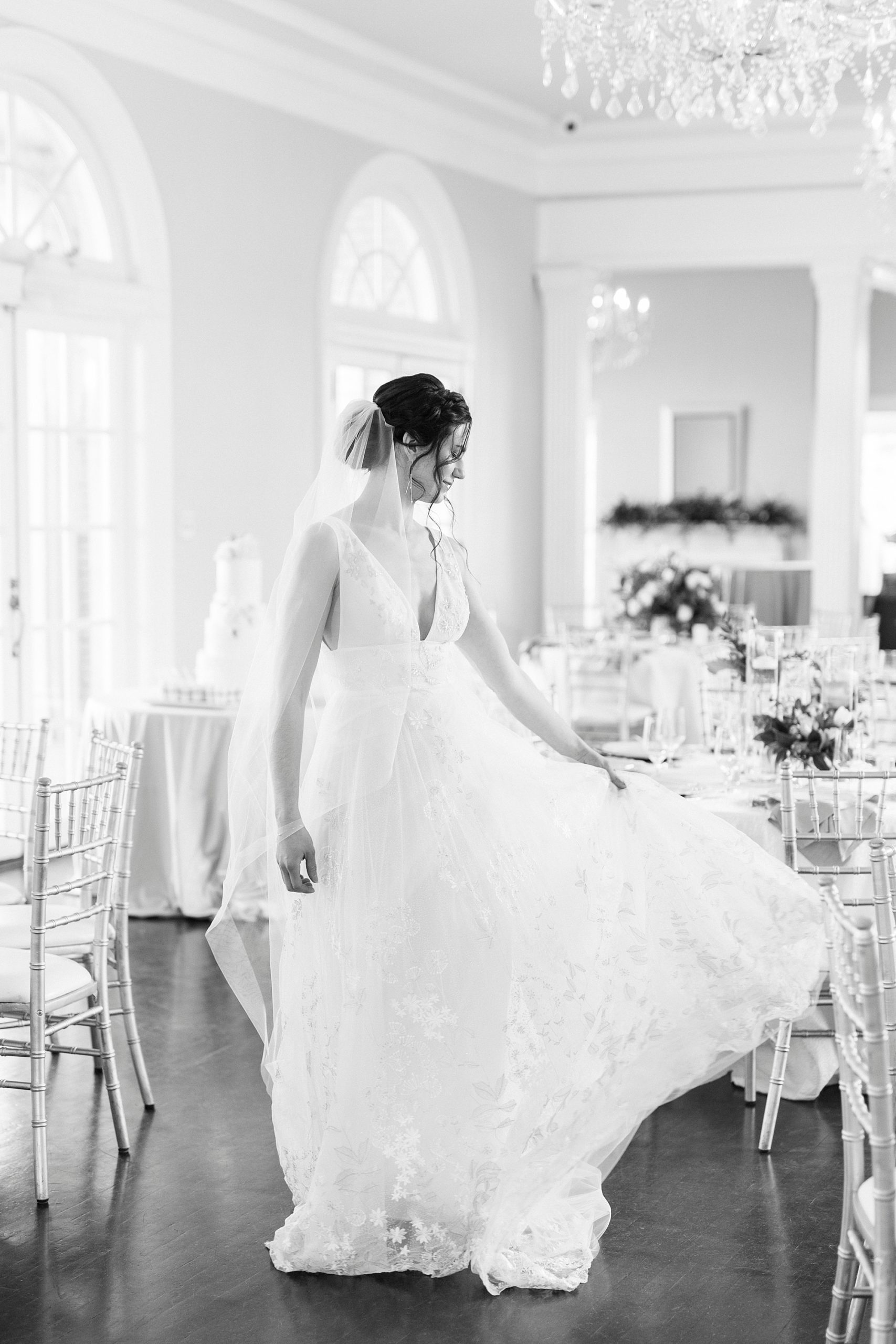 bride twirls wedding gown in reception space at Separk Mansion