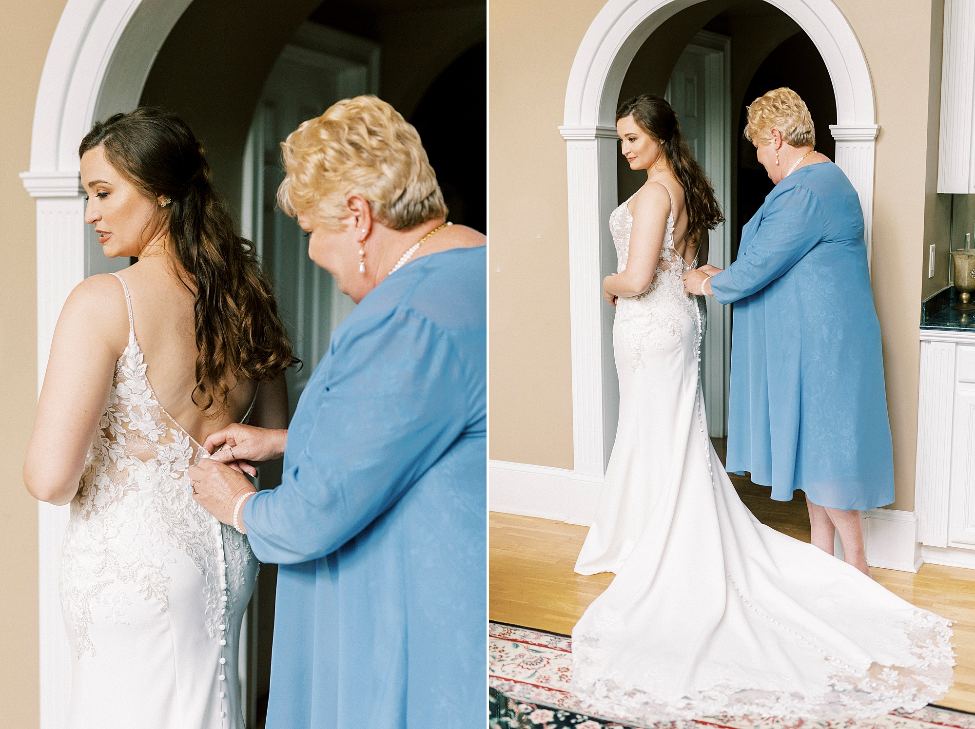 mom in blue dress helps bride into wedding dress