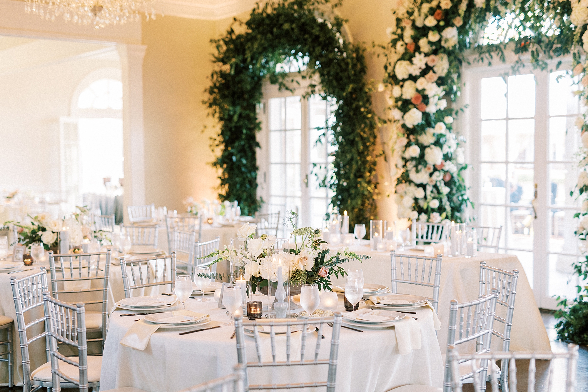 spring Separk Mansion wedding reception with ivory and pink floral arch 