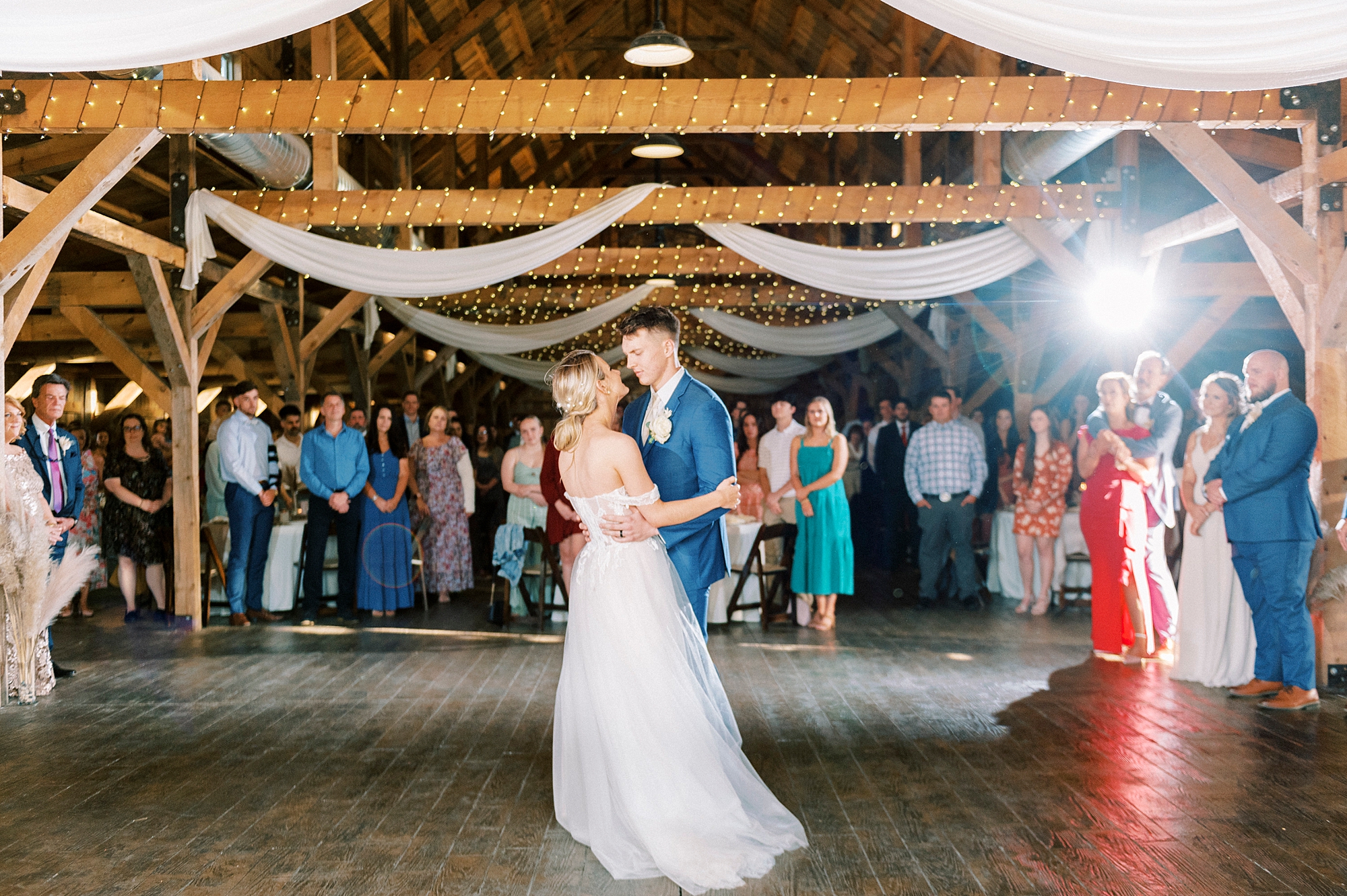bride and groom dance during reception in Concord NC