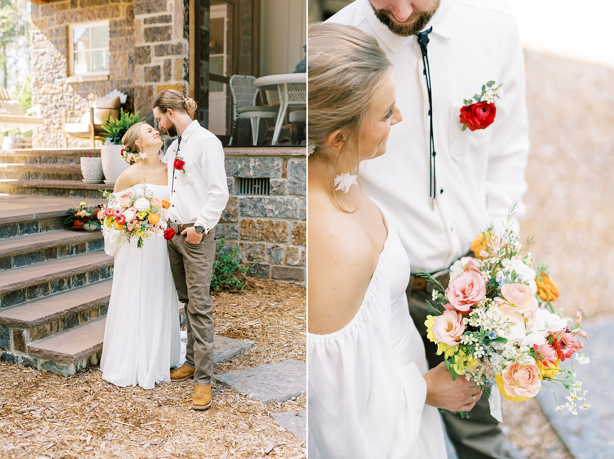 bride and groom hug by stone steps during boho inspired wedding day