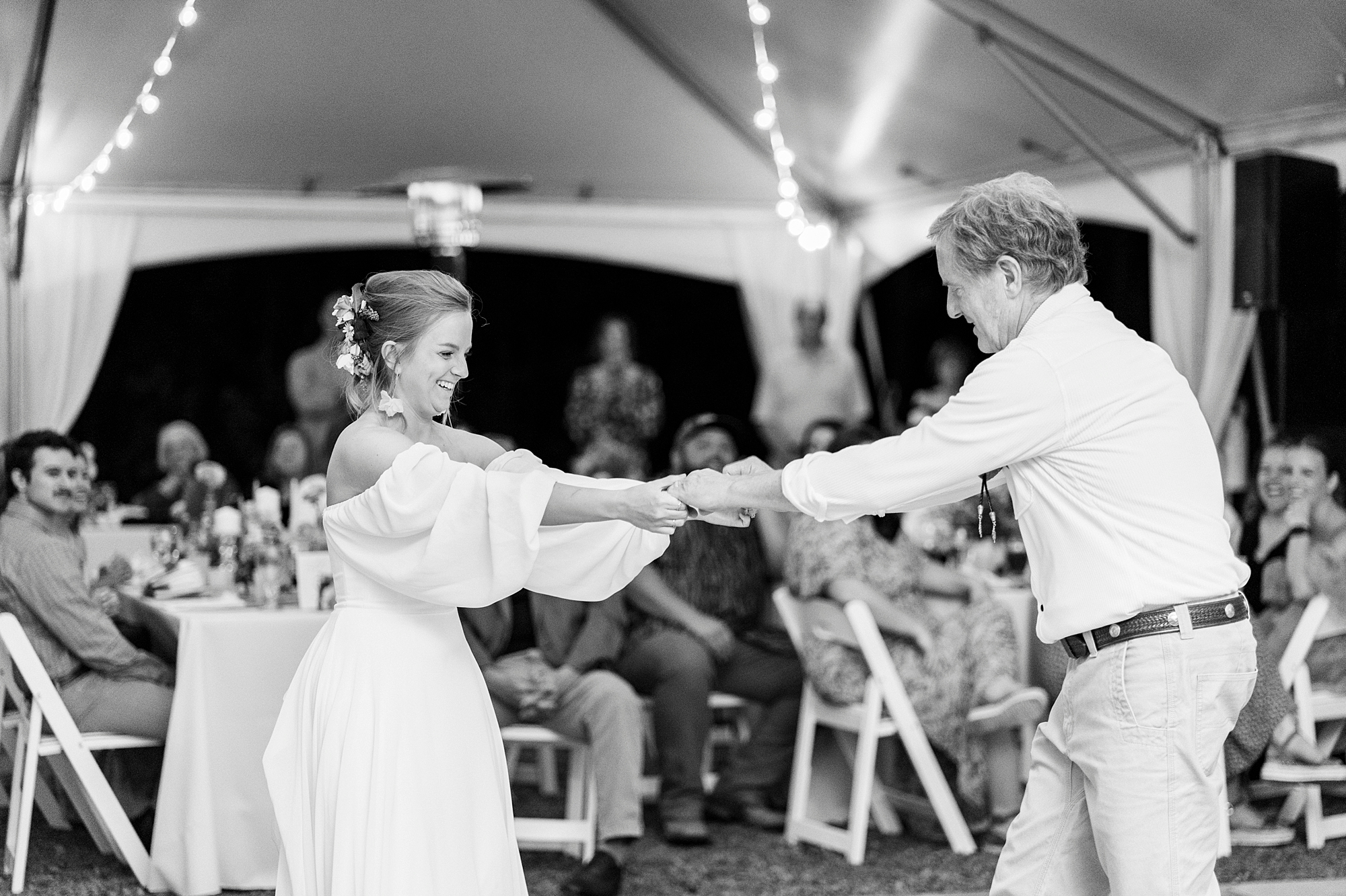 bride and dad dance during wedding reception on lawn in Richfield NC