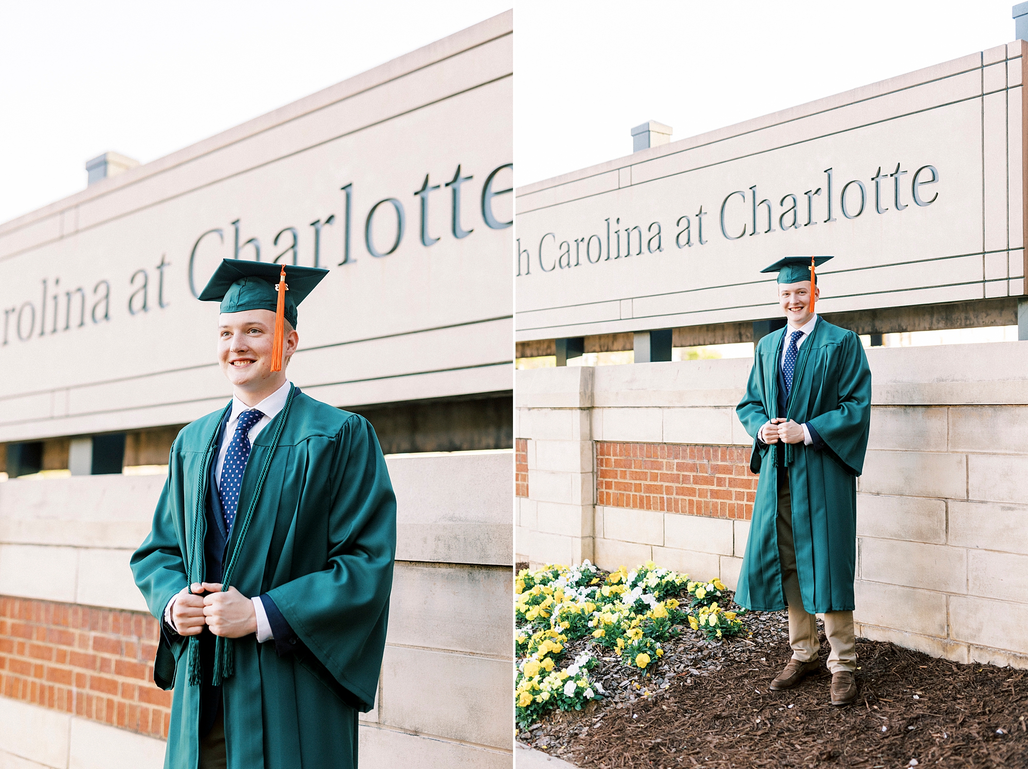 senior in green cap and gown poses near University of North Carolina at Charlotte sign