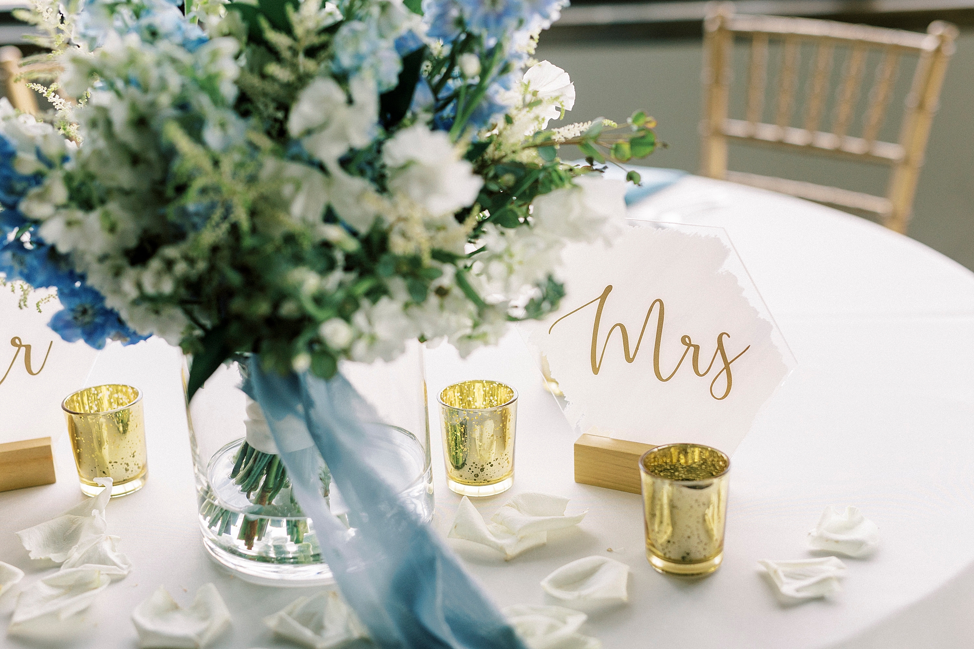 wedding reception centerpiece with calligraphy MRS on acrylic sign
