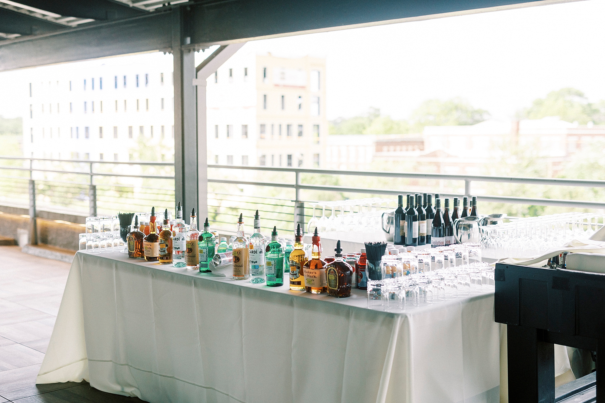 bar setup for wedding reception at the Terrace at Cedar Hill overlooking Uptown Charlotte