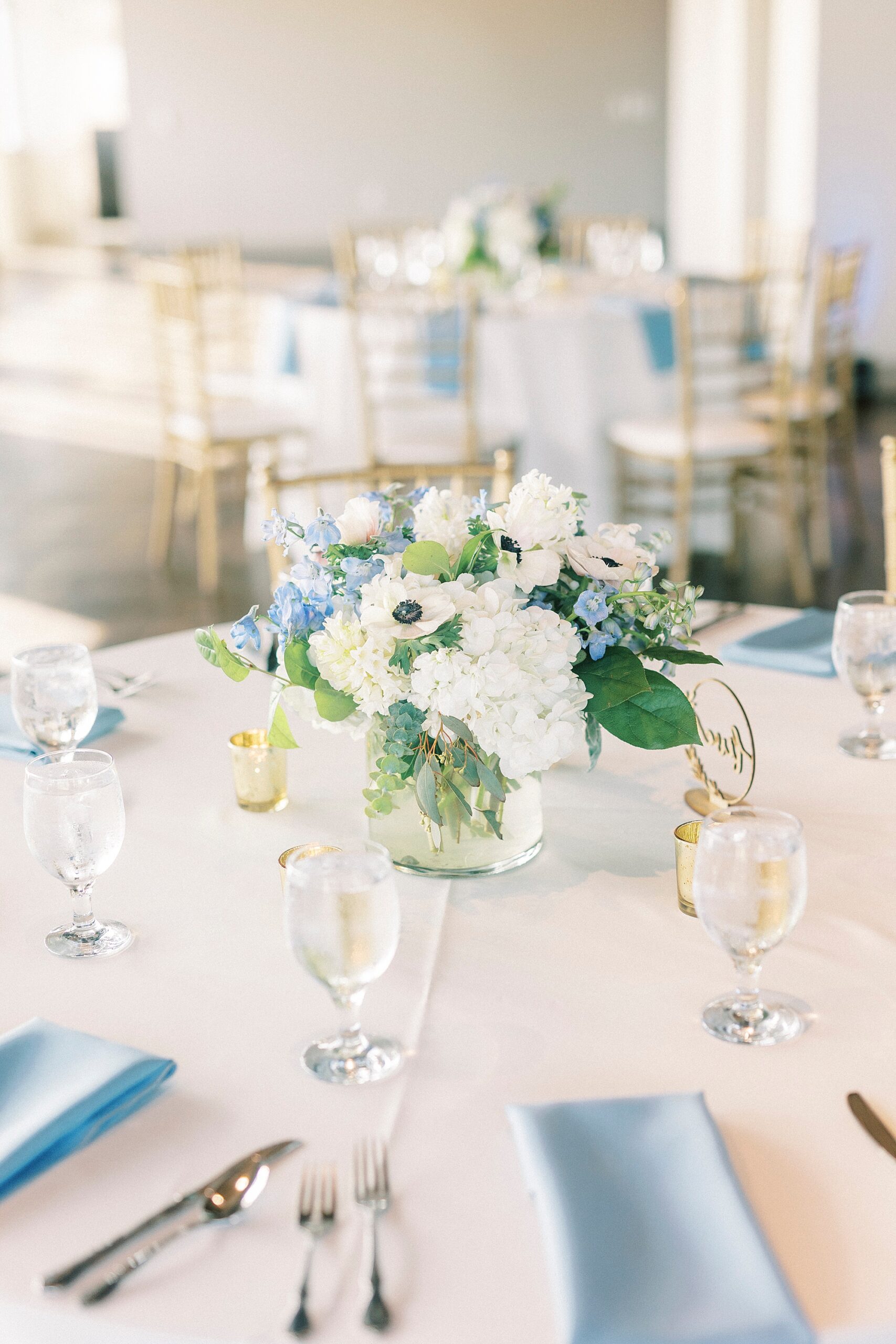 wedding centerpieces with blue and white flowers