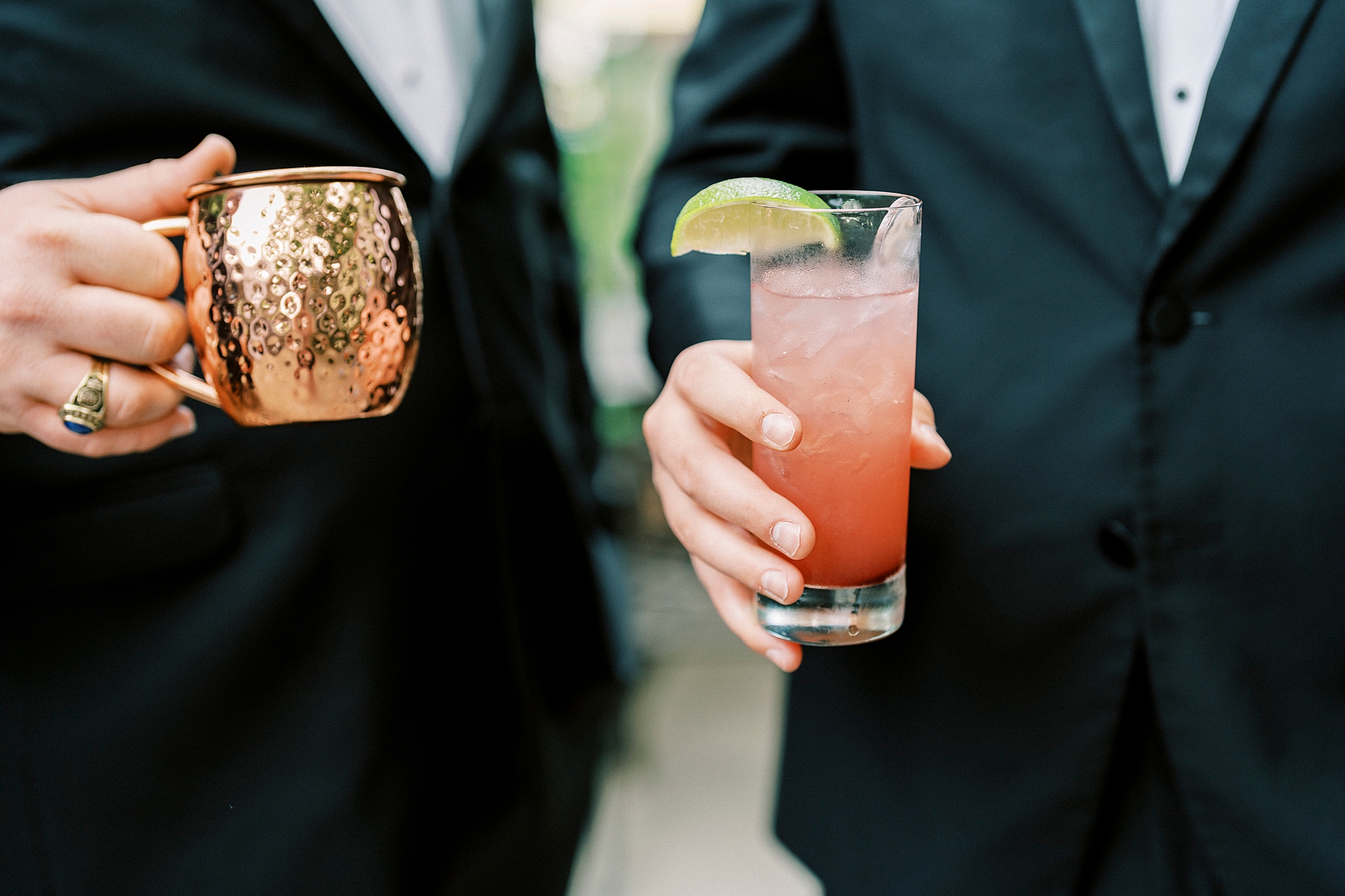 groom and groomsmen hold custom cocktails for wedding at The Spring House