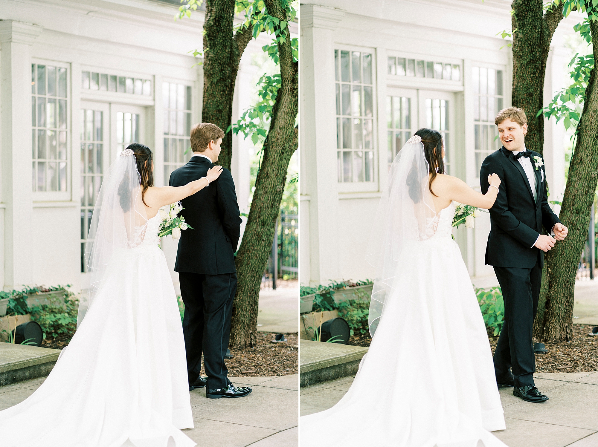 bride reaches to tap on groom's shoulder outside The Spring House